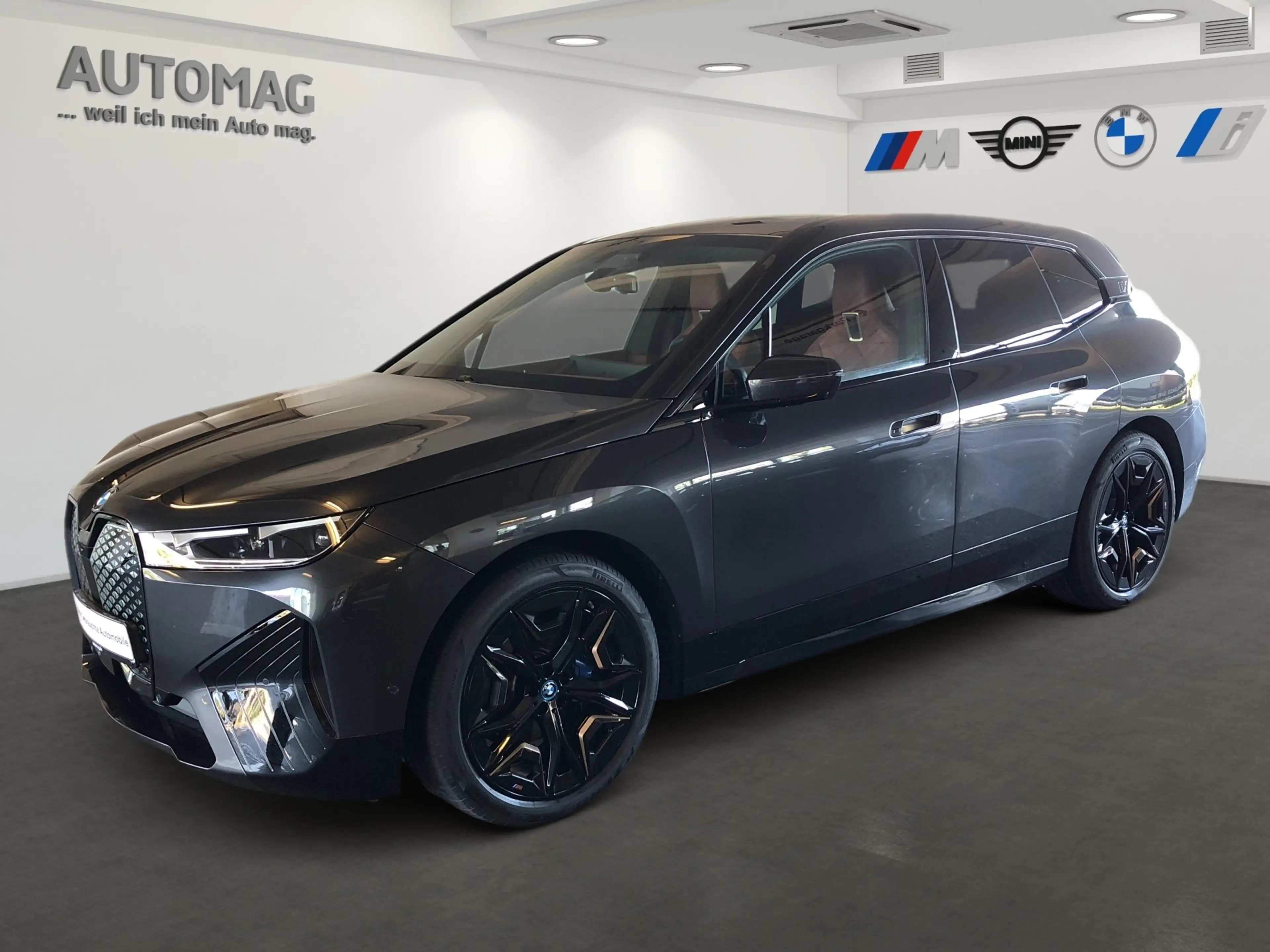 BMW iX xDrive40 Sportpaket*AHK*Laser*Suite*SkyLounge*Driv