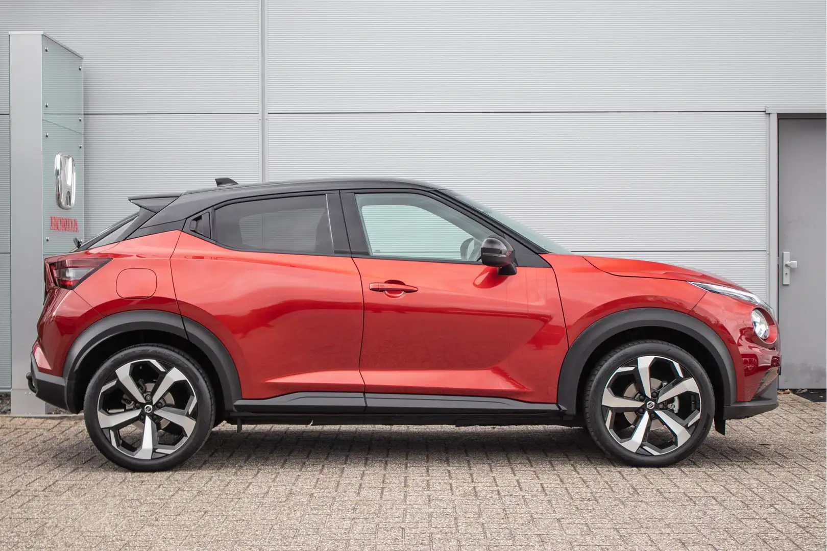 Nissan Juke 1.0 DIG-T Premiere Edition Dealerond. | Stoelverw. Rood - 2