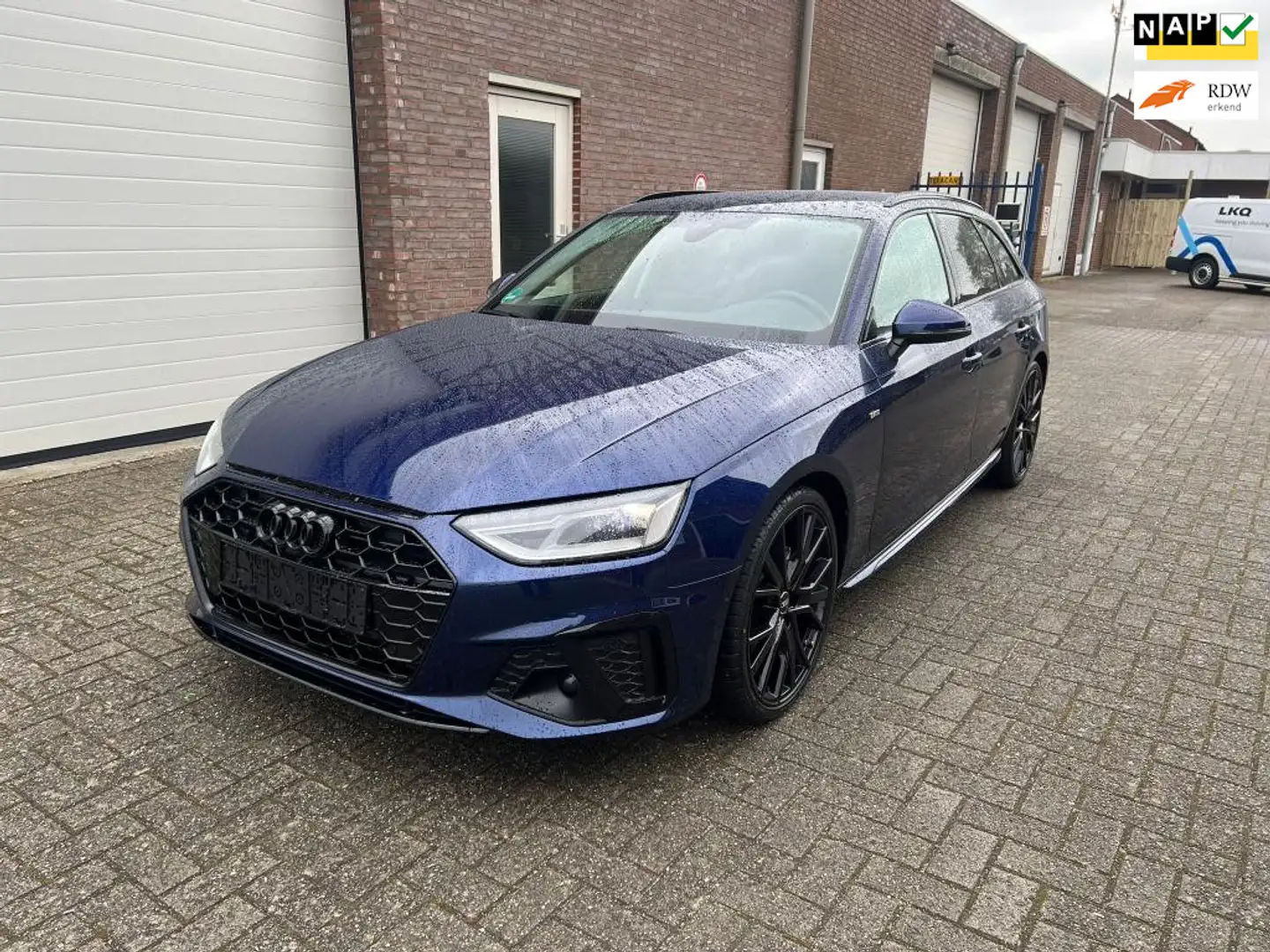 Audi A4 Avant 2.0 TFSIe S-LINE BLACK RS VELGEN VIRTUAL DIS Blauw - 1