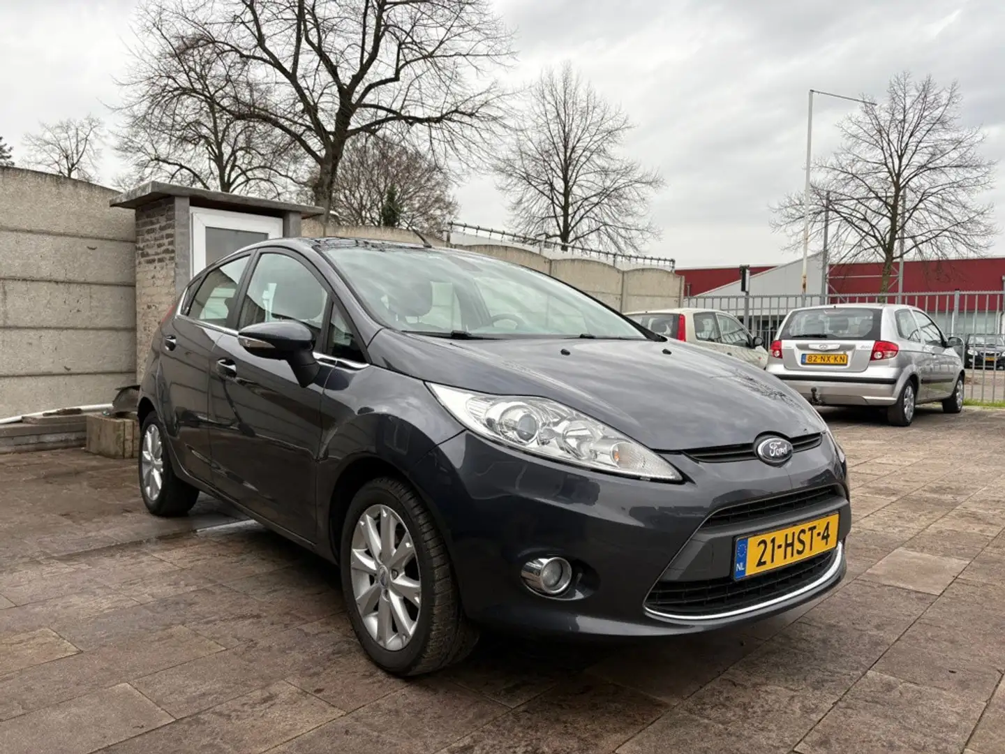 Ford Fiesta 1.25 Ghia 5drs/LM Velgen/Clima Grau - 1