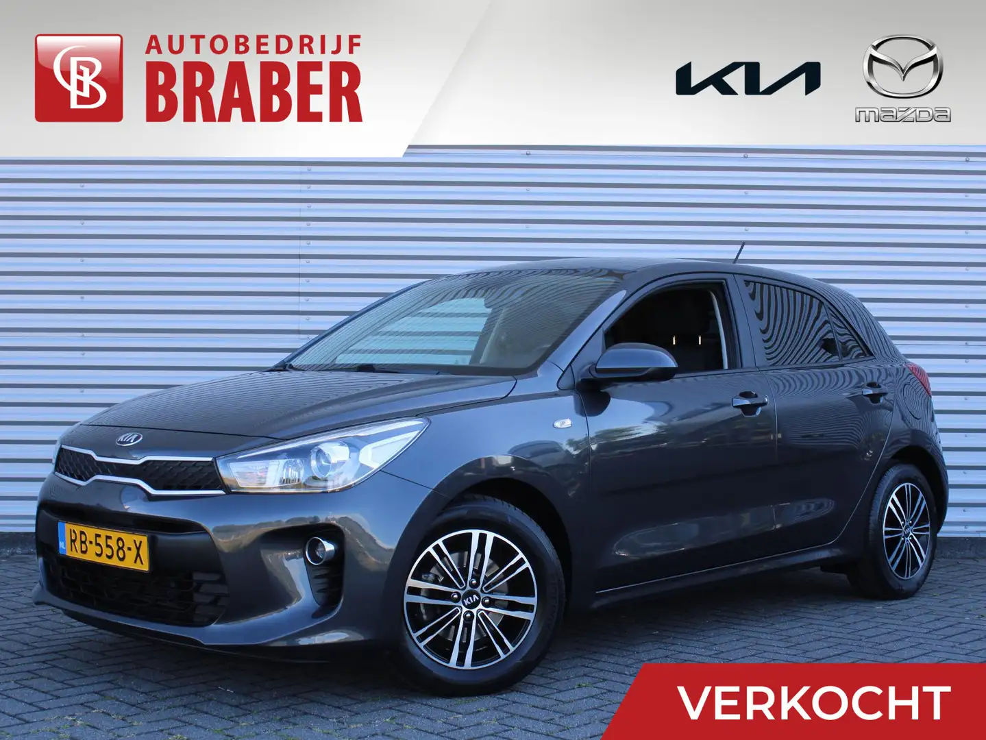 Kia Rio 1.0 TGDI ComfortPlusLine Navigator | Trekhaak | Na Grijs - 1