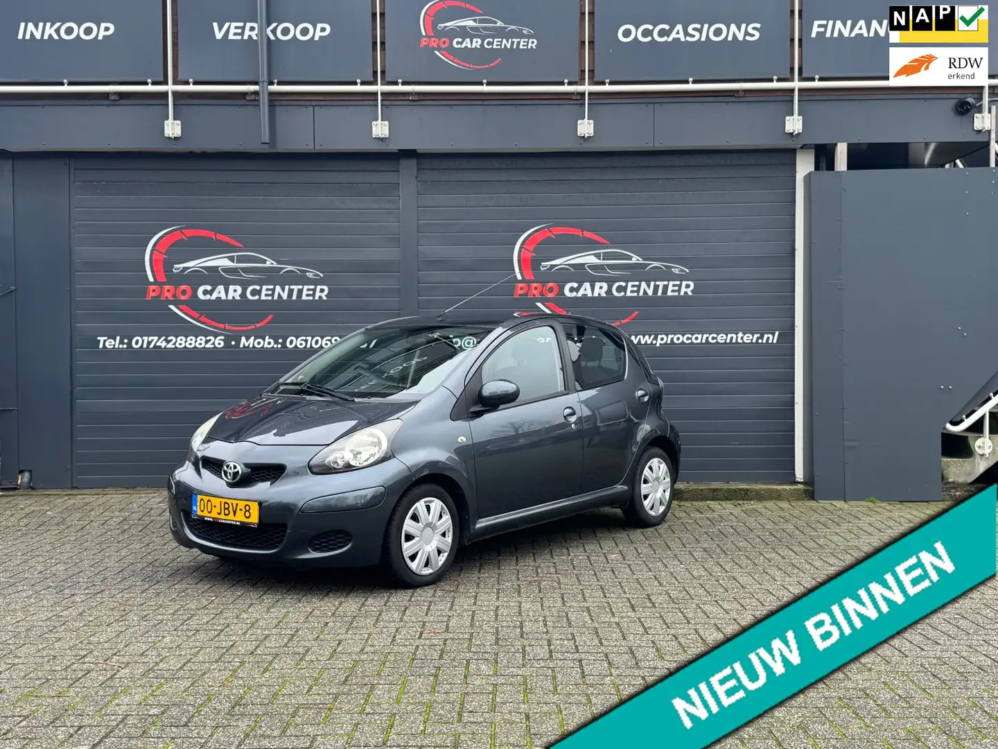 Toyota Aygo 1.0-12V Comfort AIRCO|EL.RAMEN|NAP|APK Grijs - 1