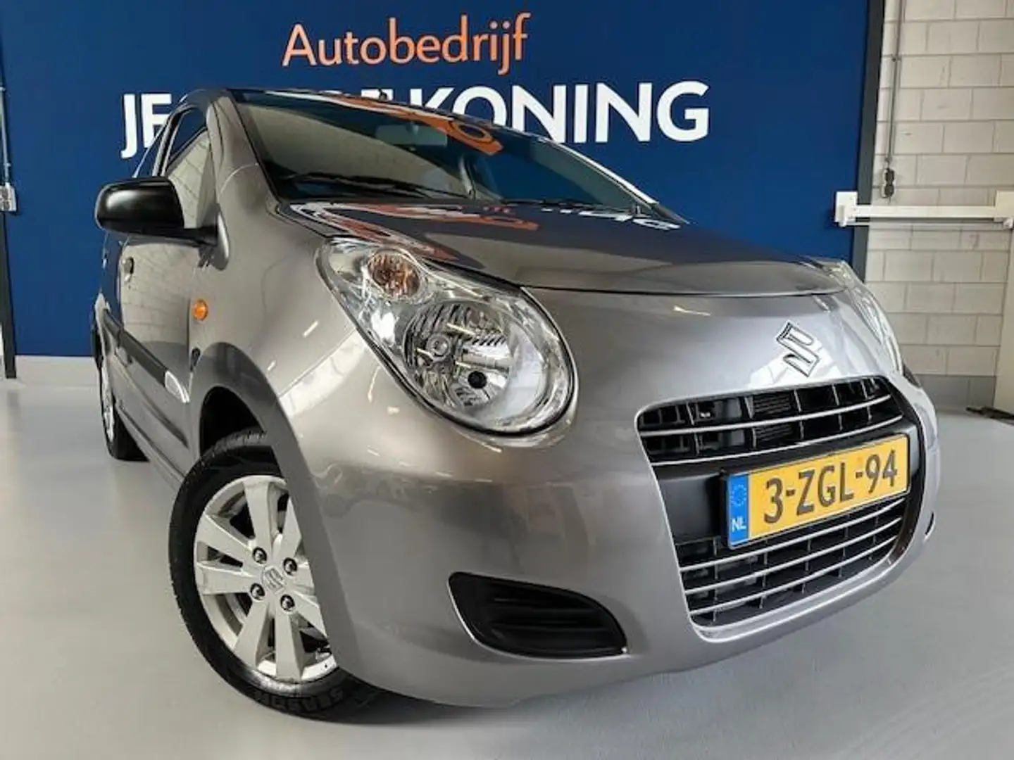 Suzuki Alto 1.0 Celebration EASSS,bj.2015,airco,NAP met 113.66 Grijs - 2