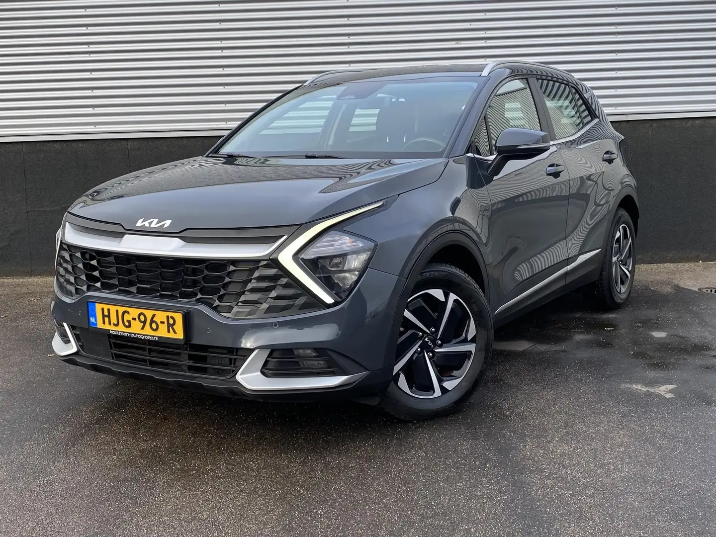 Kia Sportage 1.6 T-GDi Hybrid DynamicLine Navigatie, Parkeersen Grijs - 2