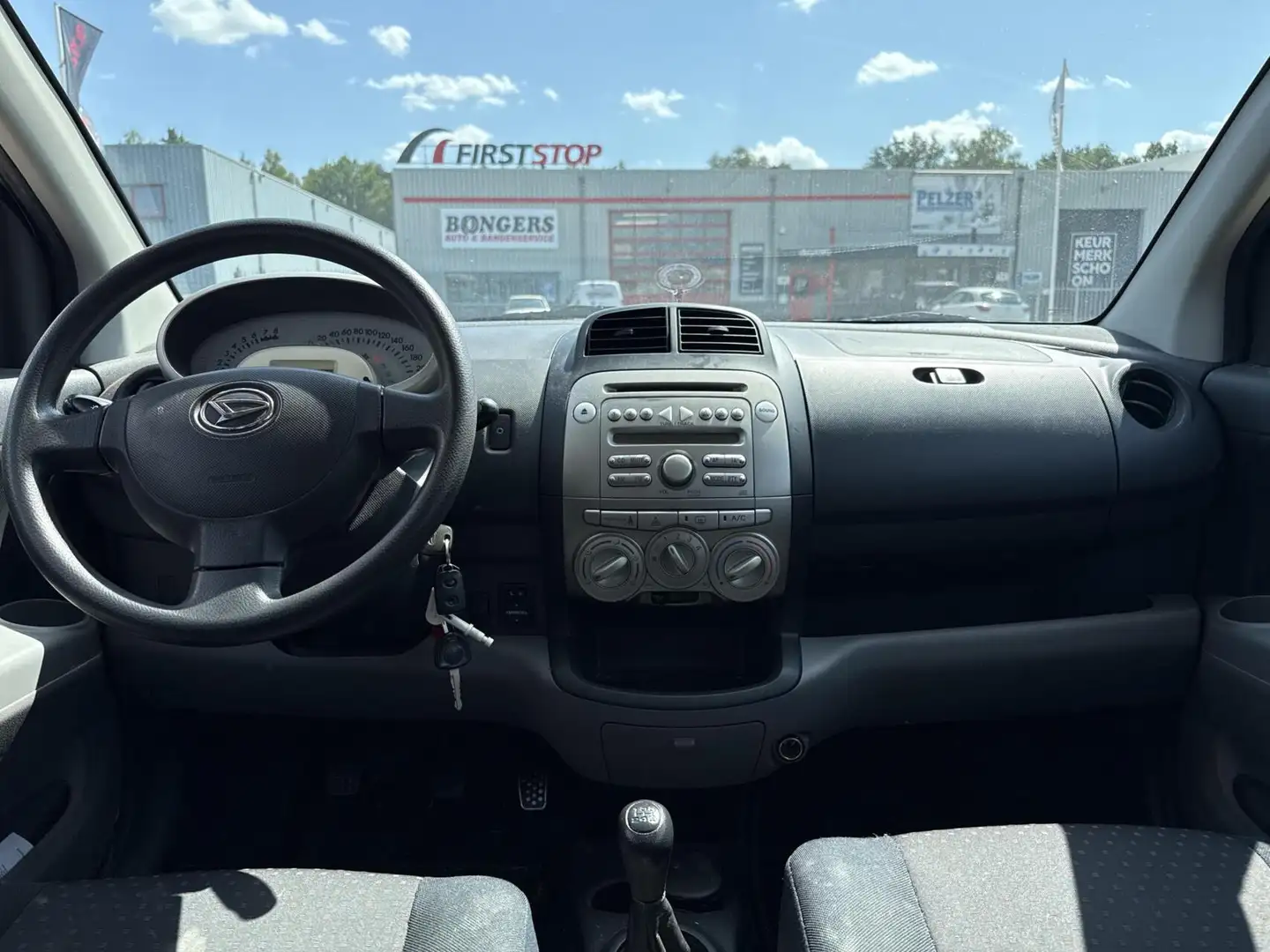 Daihatsu Sirion 2 1.0-12V Premium, airco, centrale vergrendeling, Grau - 2