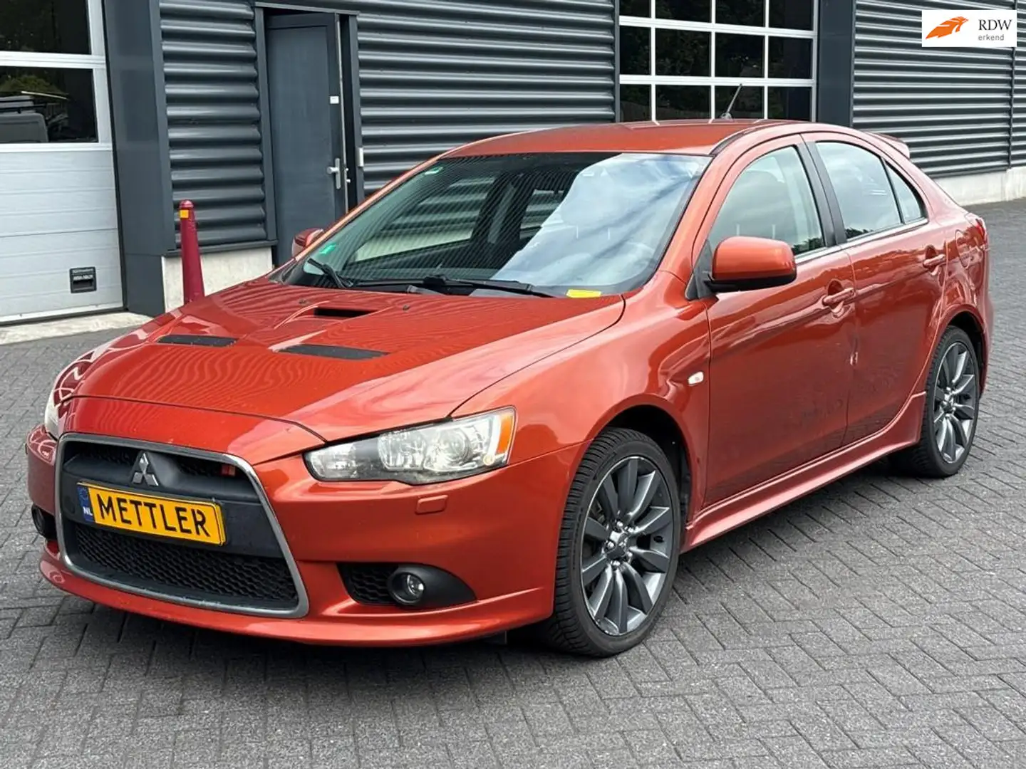 Mitsubishi Lancer Sports Sedan 2.0 Evolution MR Narancs - 1