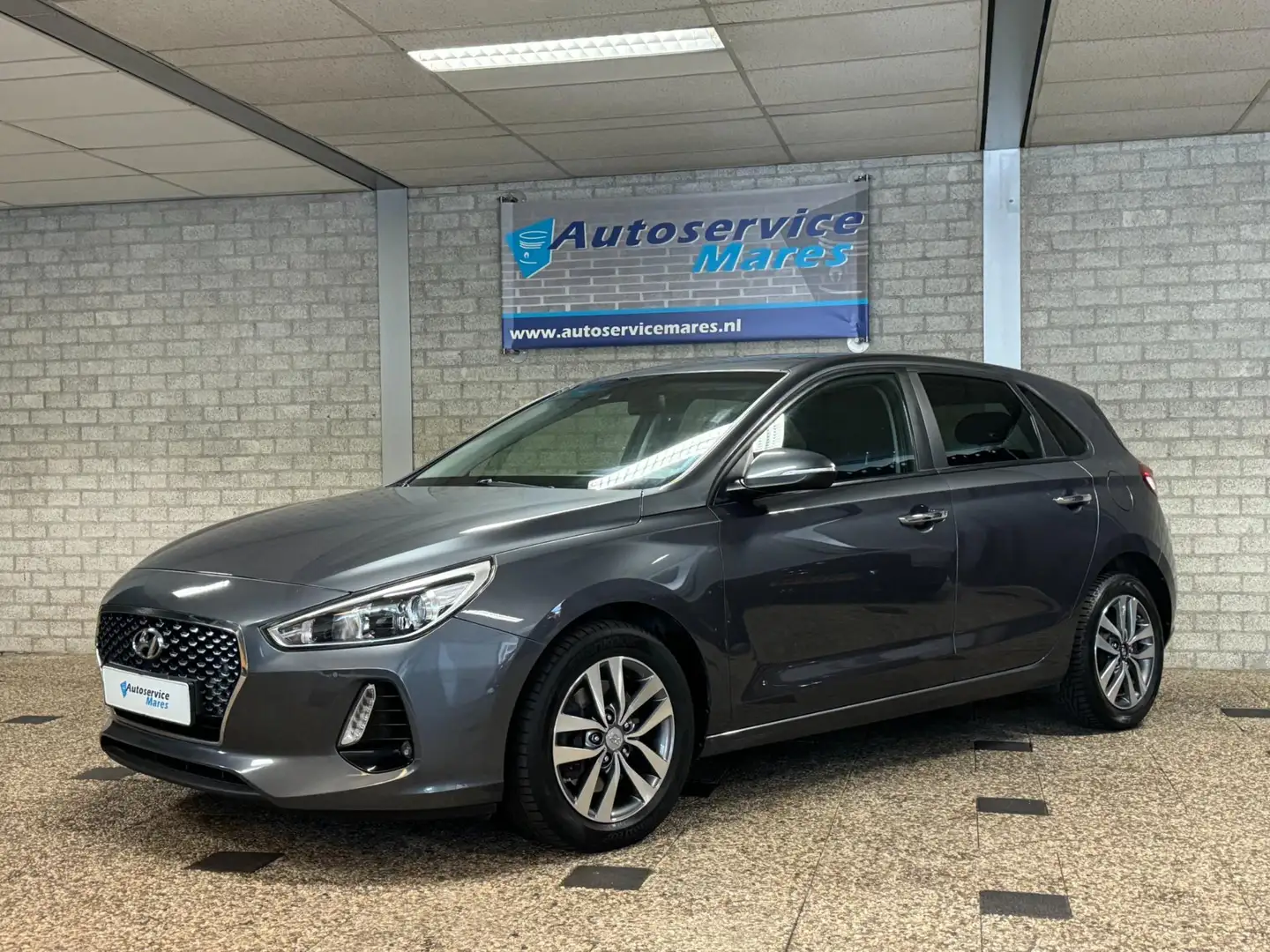 Hyundai i30 1.0 T-GDI Premium, navi, camera, Cruise, 2x PDC, 1 Grijs - 1