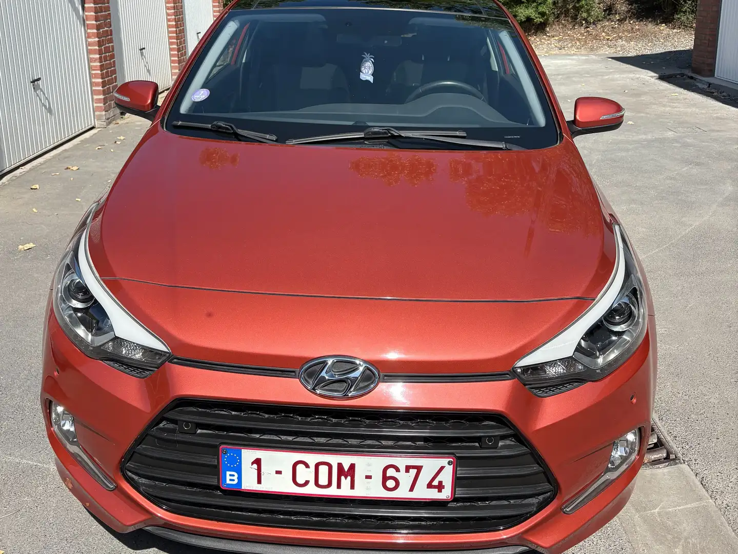 Hyundai i20 i20 Coupé 1.2i Sport Oranje - 1