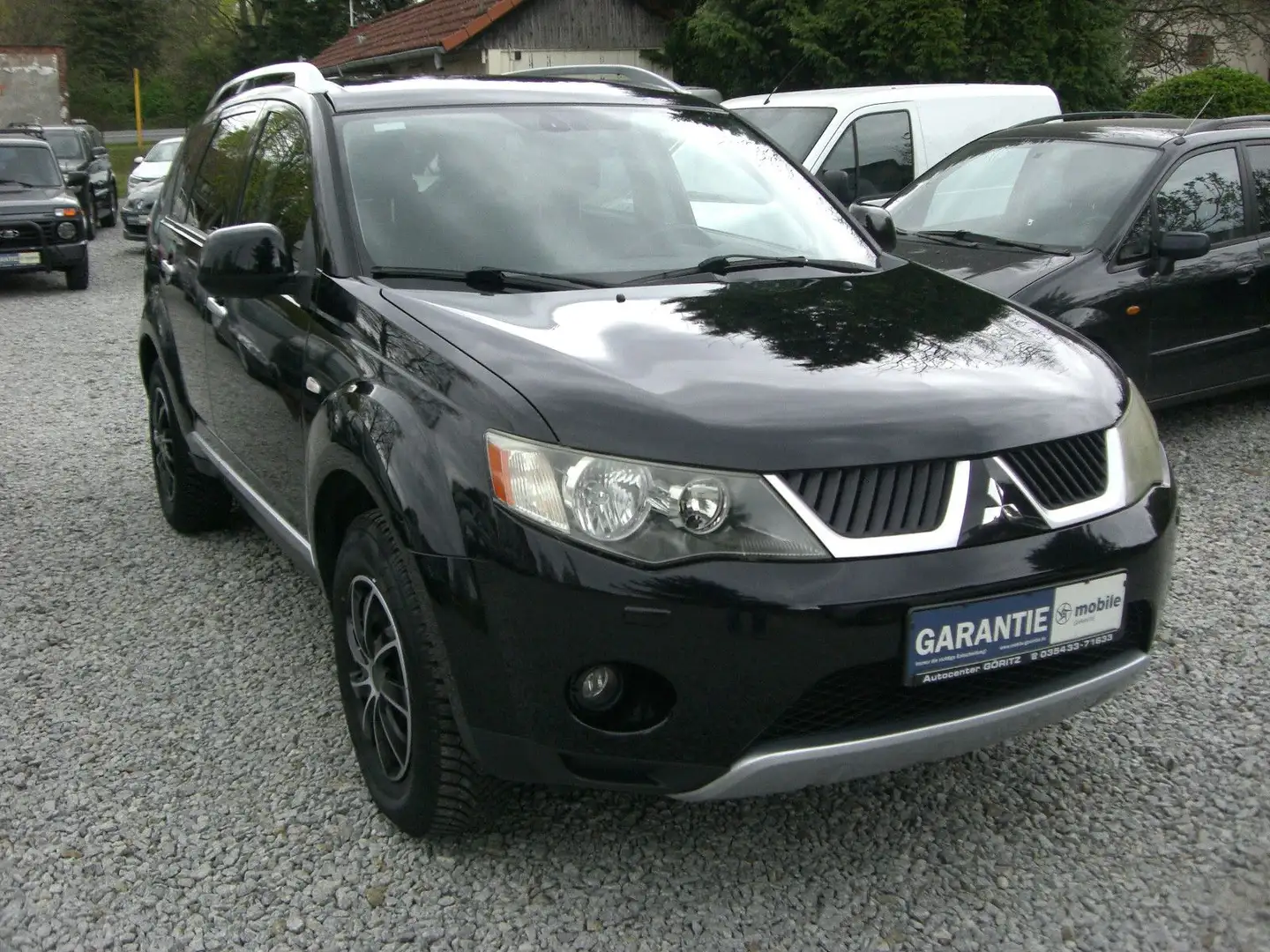 Mitsubishi Outlander 2.4 Intense 1.Hand,Klima&Automatik Schwarz - 1