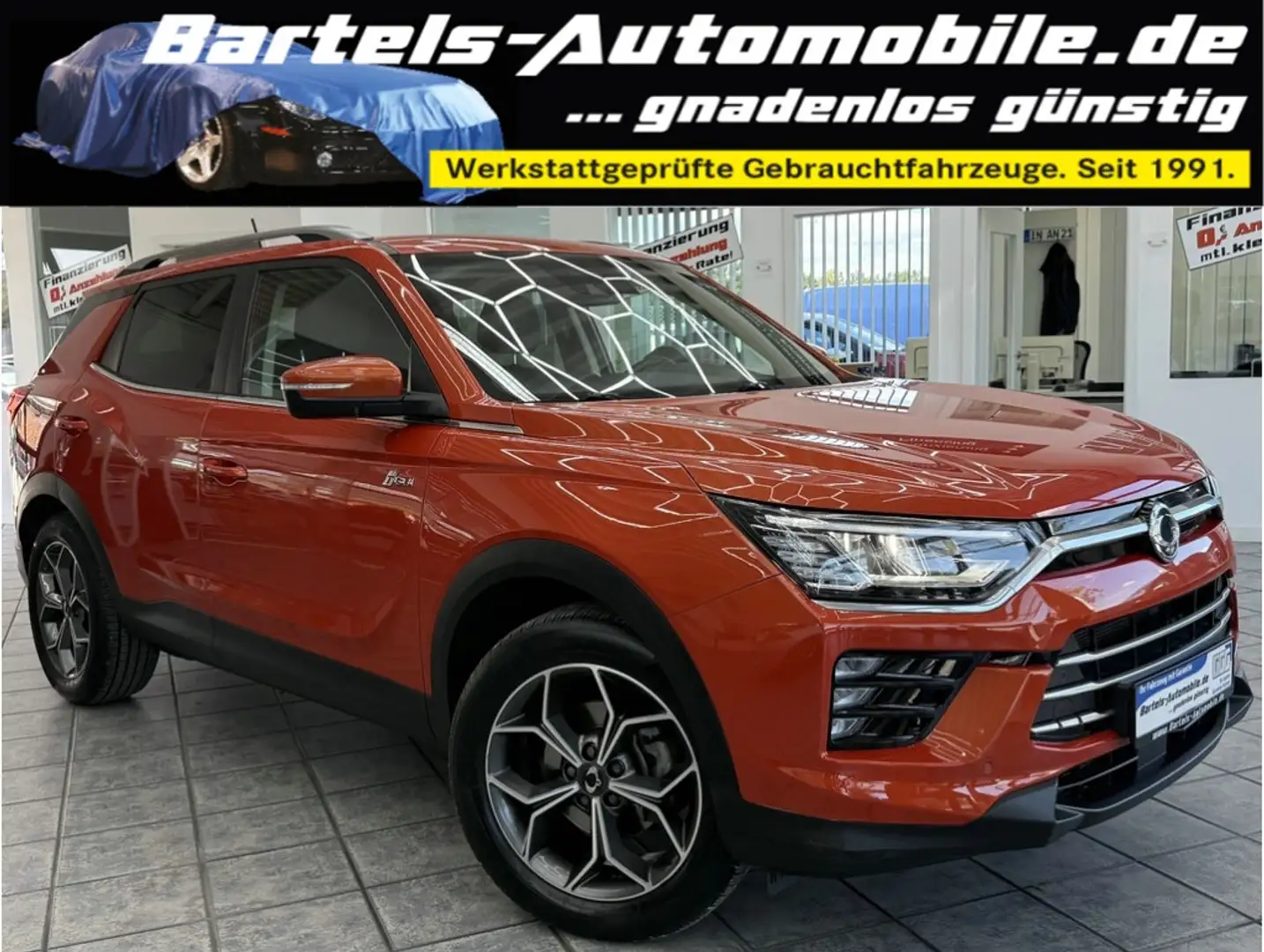SsangYong Korando 1.5 T-GDI AWD, 1.Hand, LED, Leder, AHK Orange - 1
