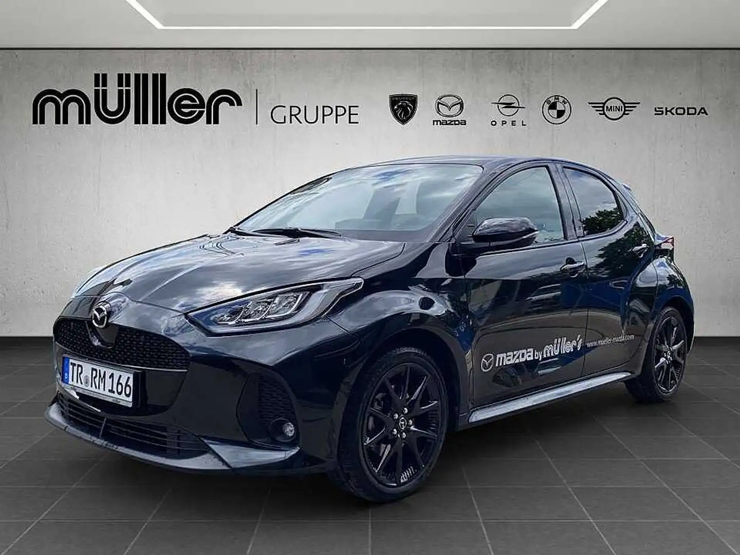 Mazda 2 Hybrid VVT-i 116 PS e-CVT FWD HOMURA PLUS VVT-i 11 Schwarz - 1