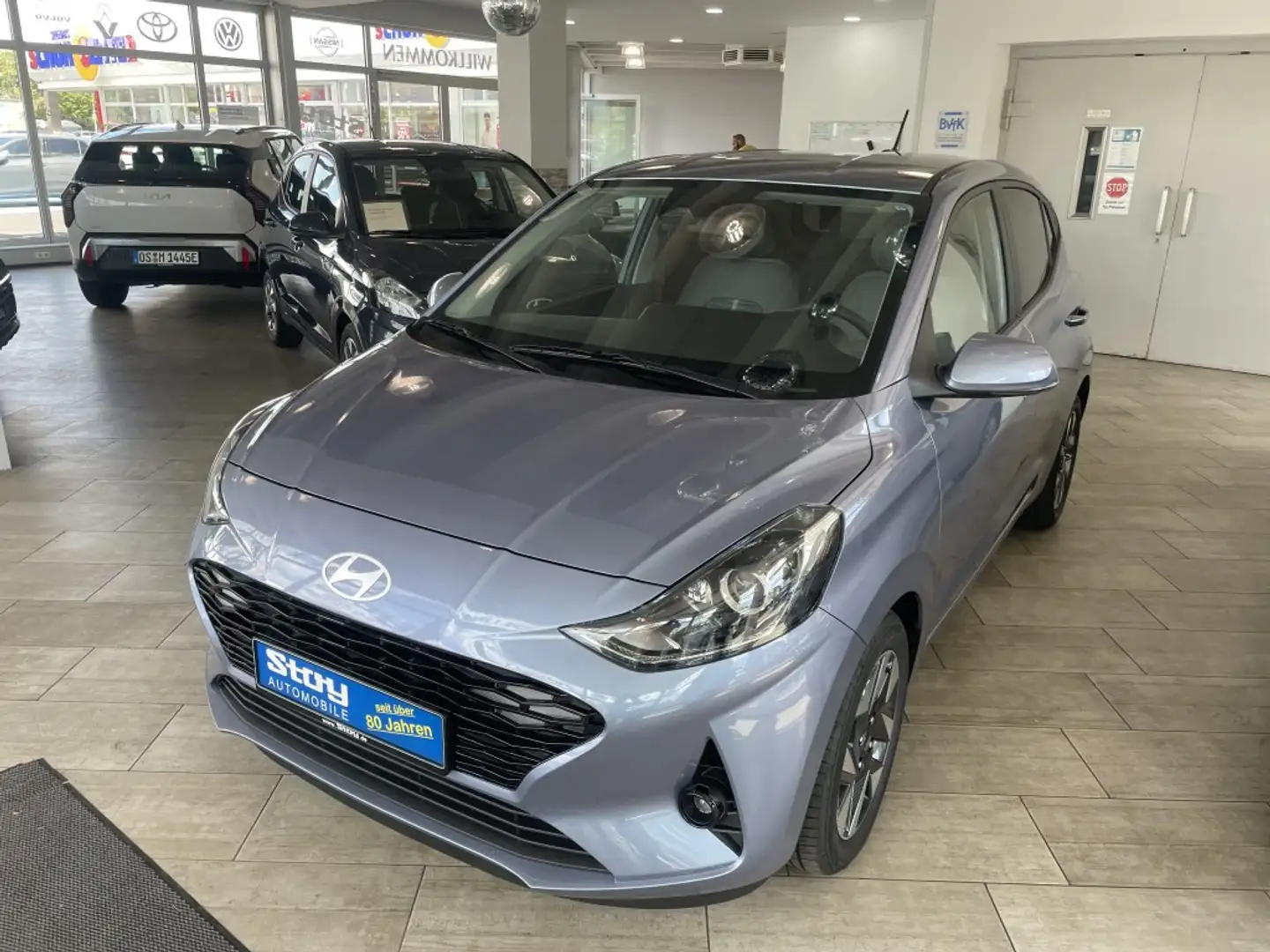 Hyundai i10 Modell 2025 1.2 Navi Kamera PDC Klimaauto SHZ Blau - 1