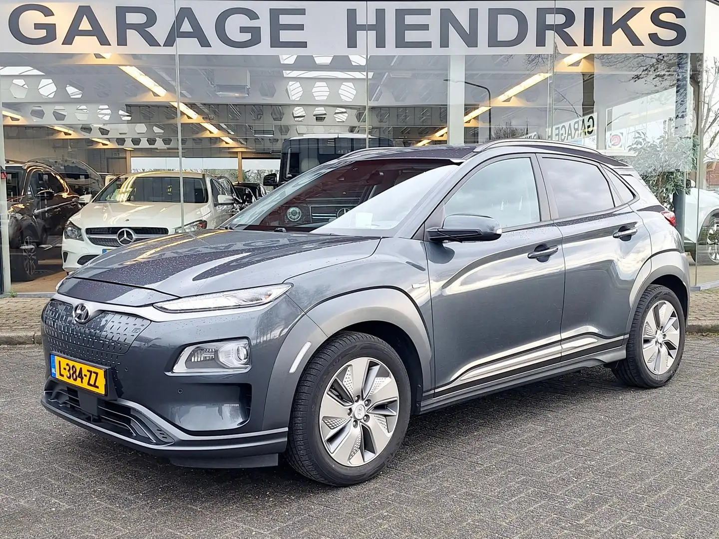 Hyundai KONA EV Premium 64 kWh | SOH: 94,6% | Leder | Warmtepom Grau - 1