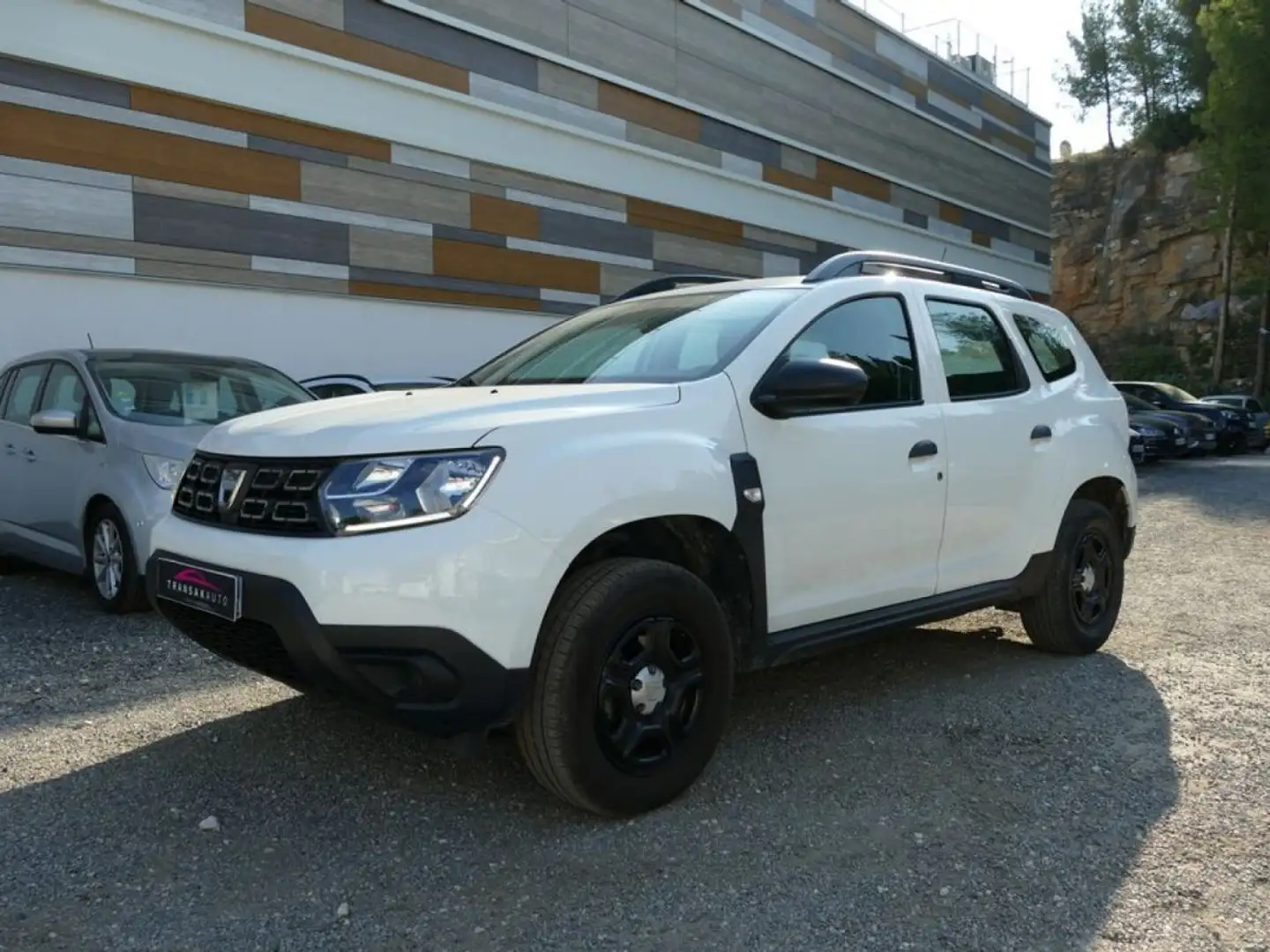 Dacia Duster 1.0 TCE 100 Ch ESSENTIEL CARPLAY BVM6 Wit - 1