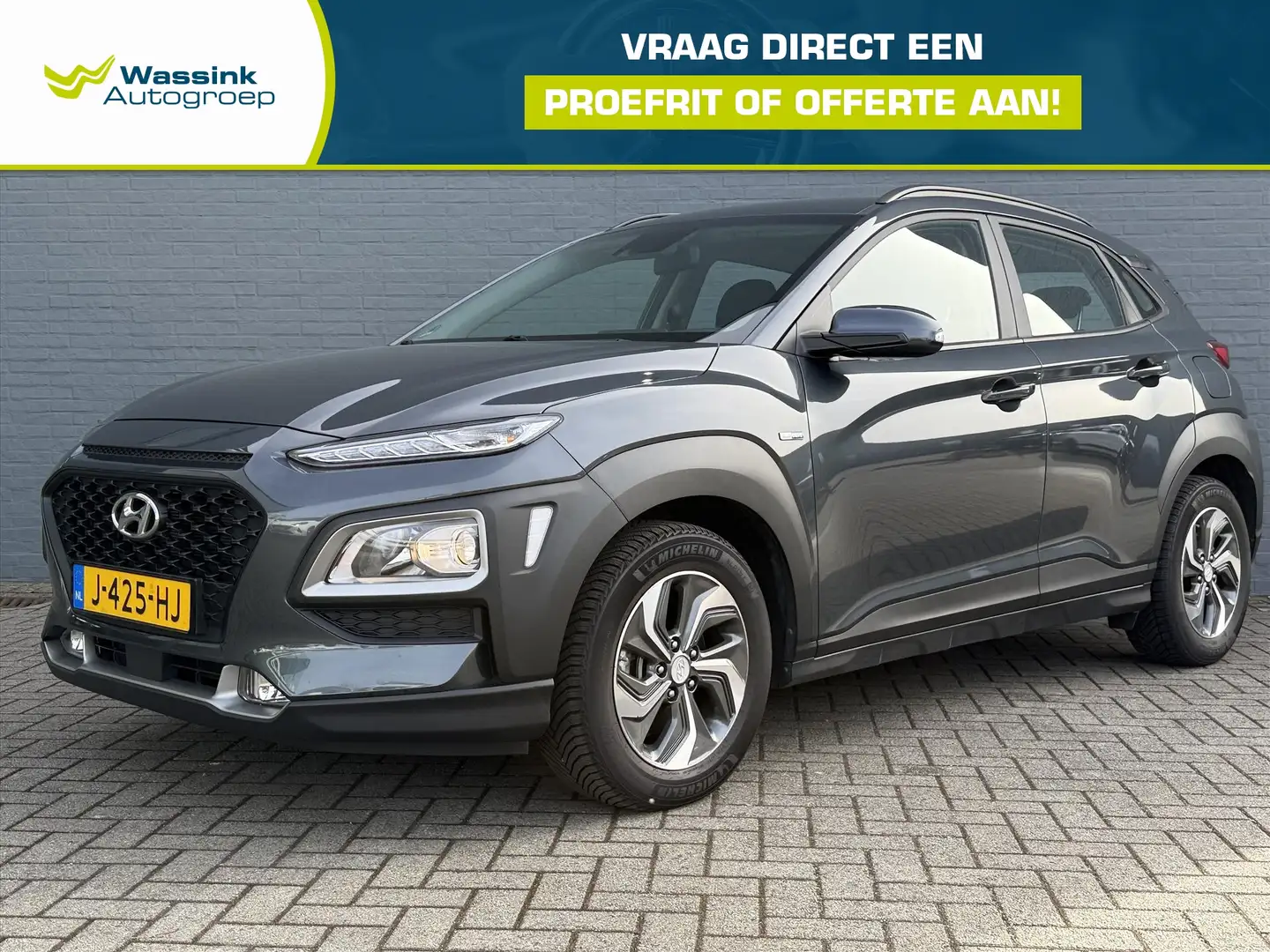 Hyundai KONA GDI 141pk HEV 2WD Aut. Comfort Smart | Navigatie | Gris - 1
