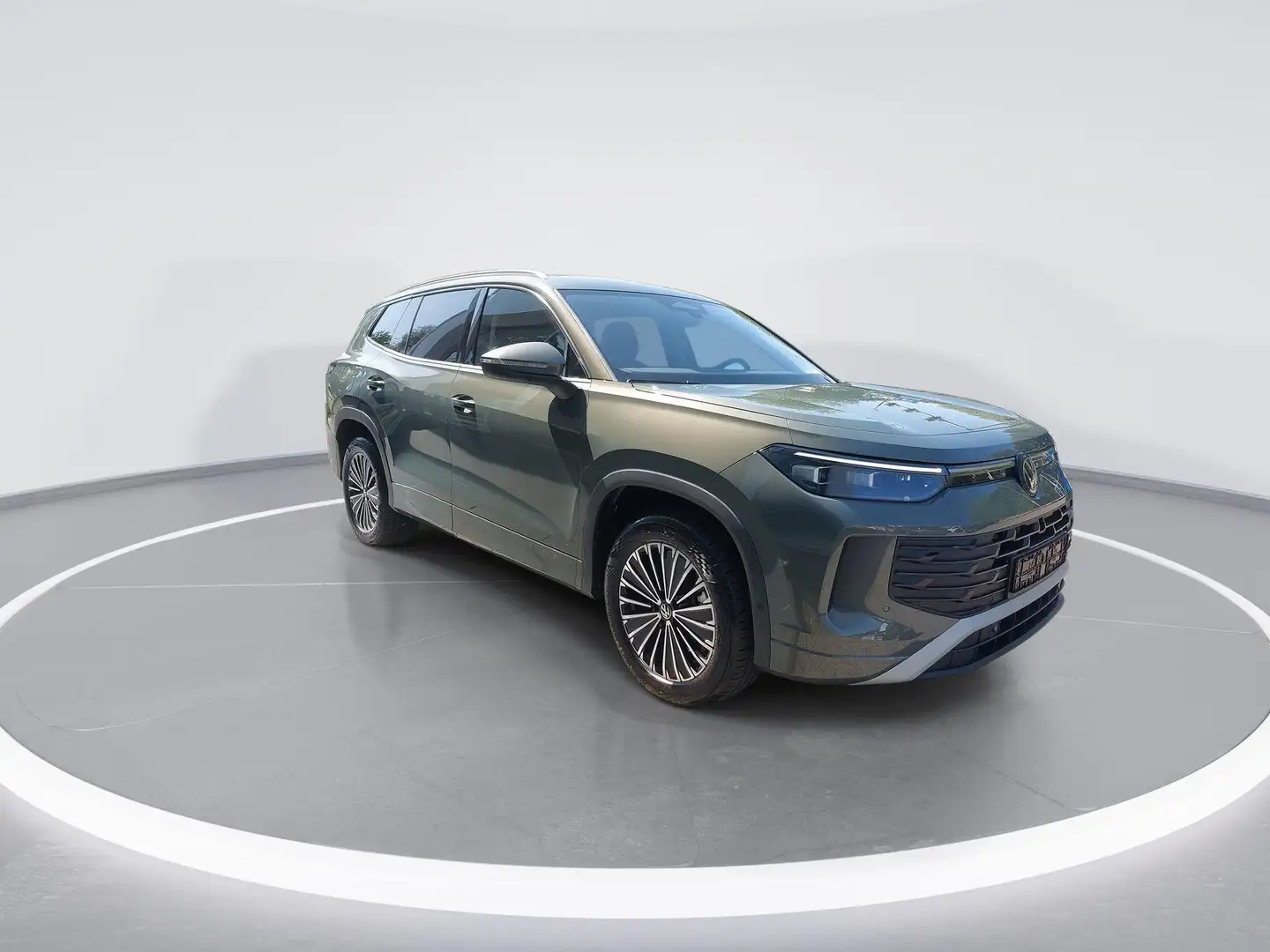 Volkswagen Tayron Life Edition 1.5 eHybrid 204 pk 6 versn. DSG · Com Groen - 2