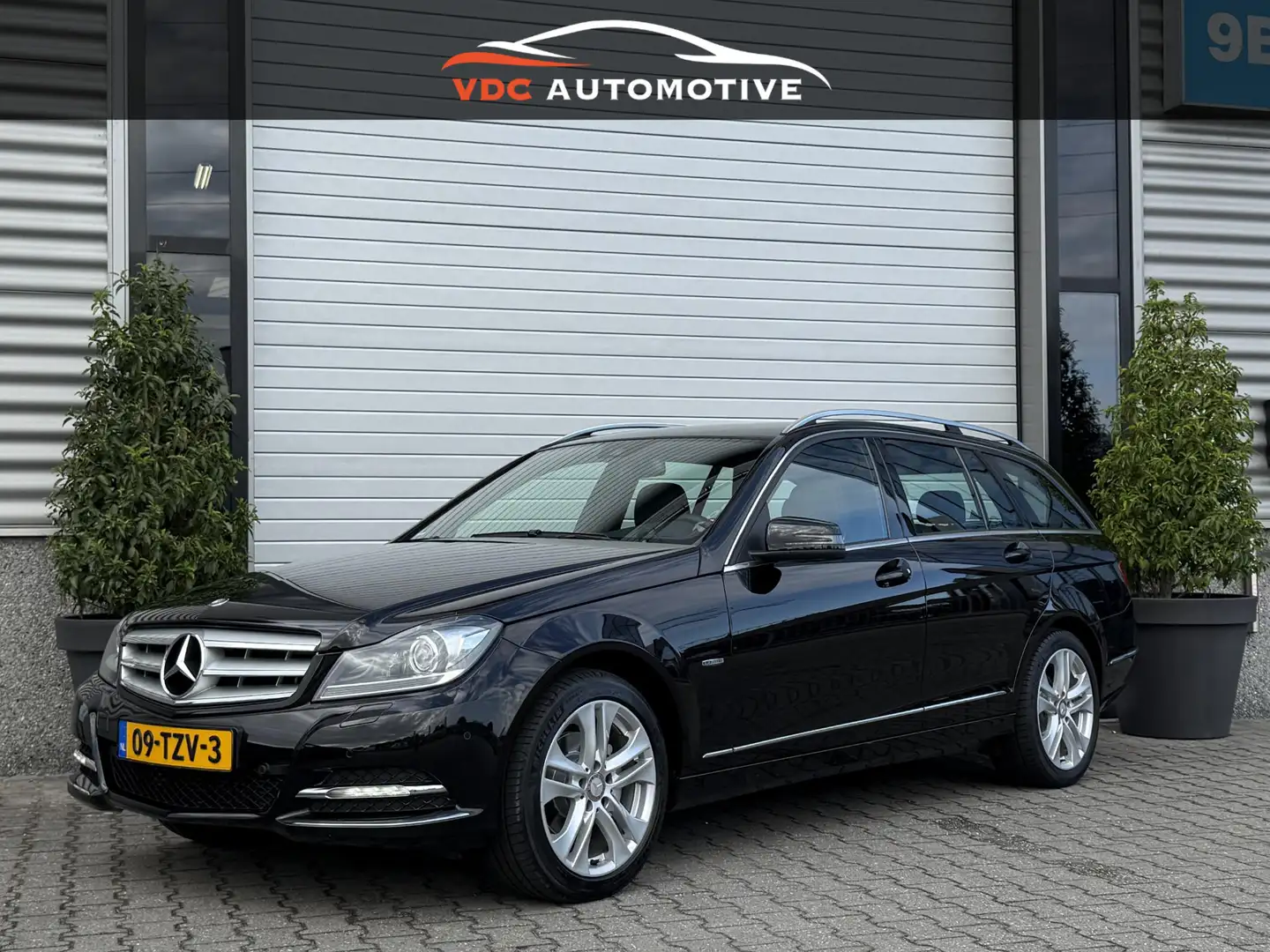 Mercedes-Benz C 180 Avantgarde Estate Edition | Xenon | 1e Eigenaar | Zwart - 1