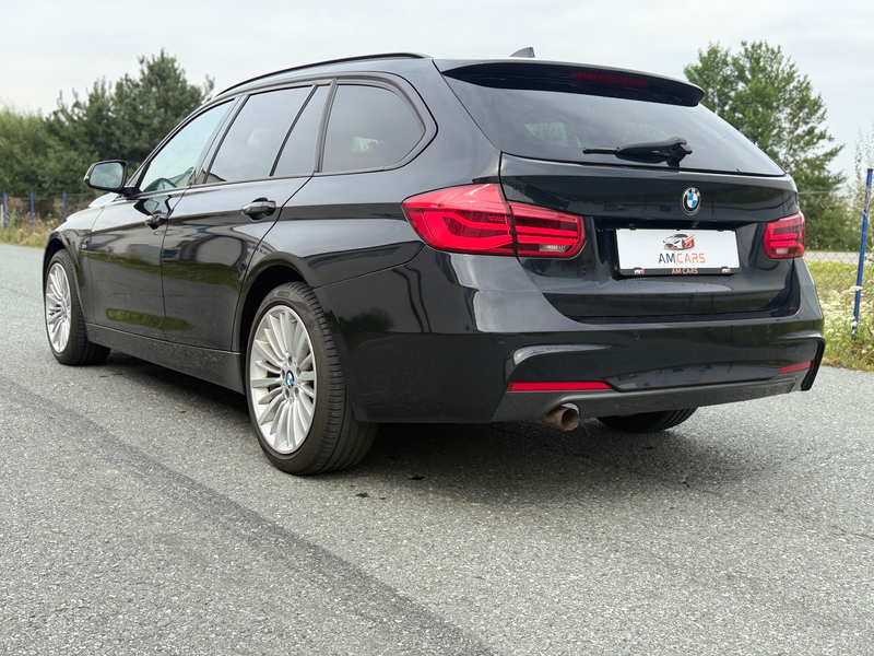 BMW 318 318d xDrive Touring Sport Line — photo 12