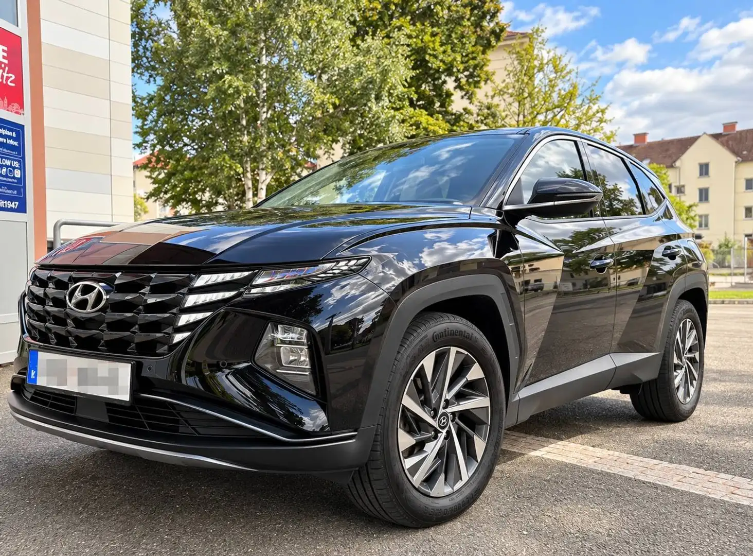 Hyundai TUCSON Tucson 1,6 T-GDI 2WD 48V Trend Line inkl. neuwertige Winterkompletträder Schwarz - 1