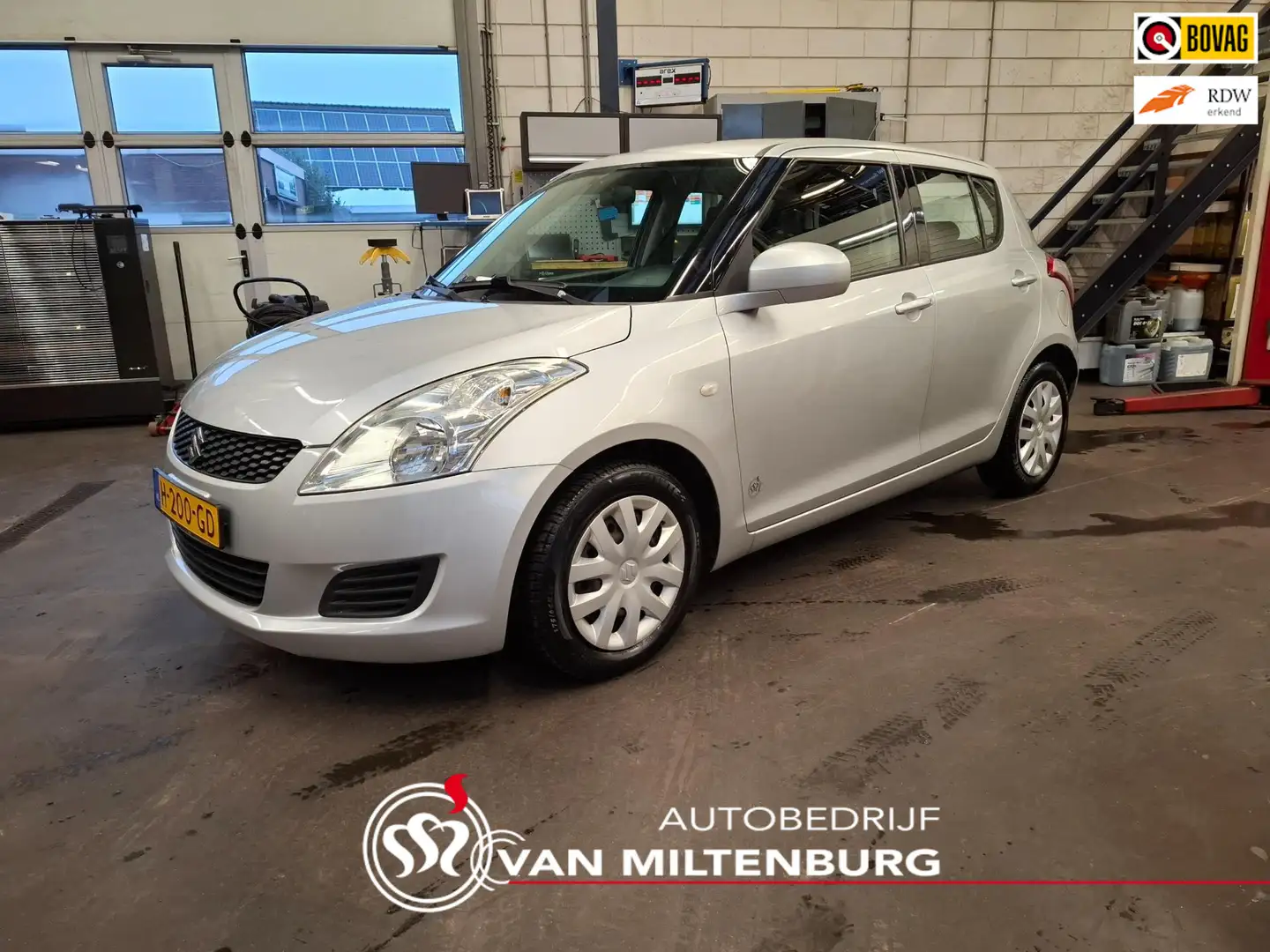 Suzuki Swift 1.2 Comfort Airco All Season banden Grau - 1