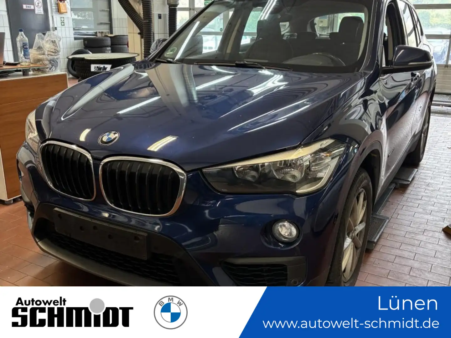 BMW X1 sDrive18i Advantage + GARANTIE Blauw - 1