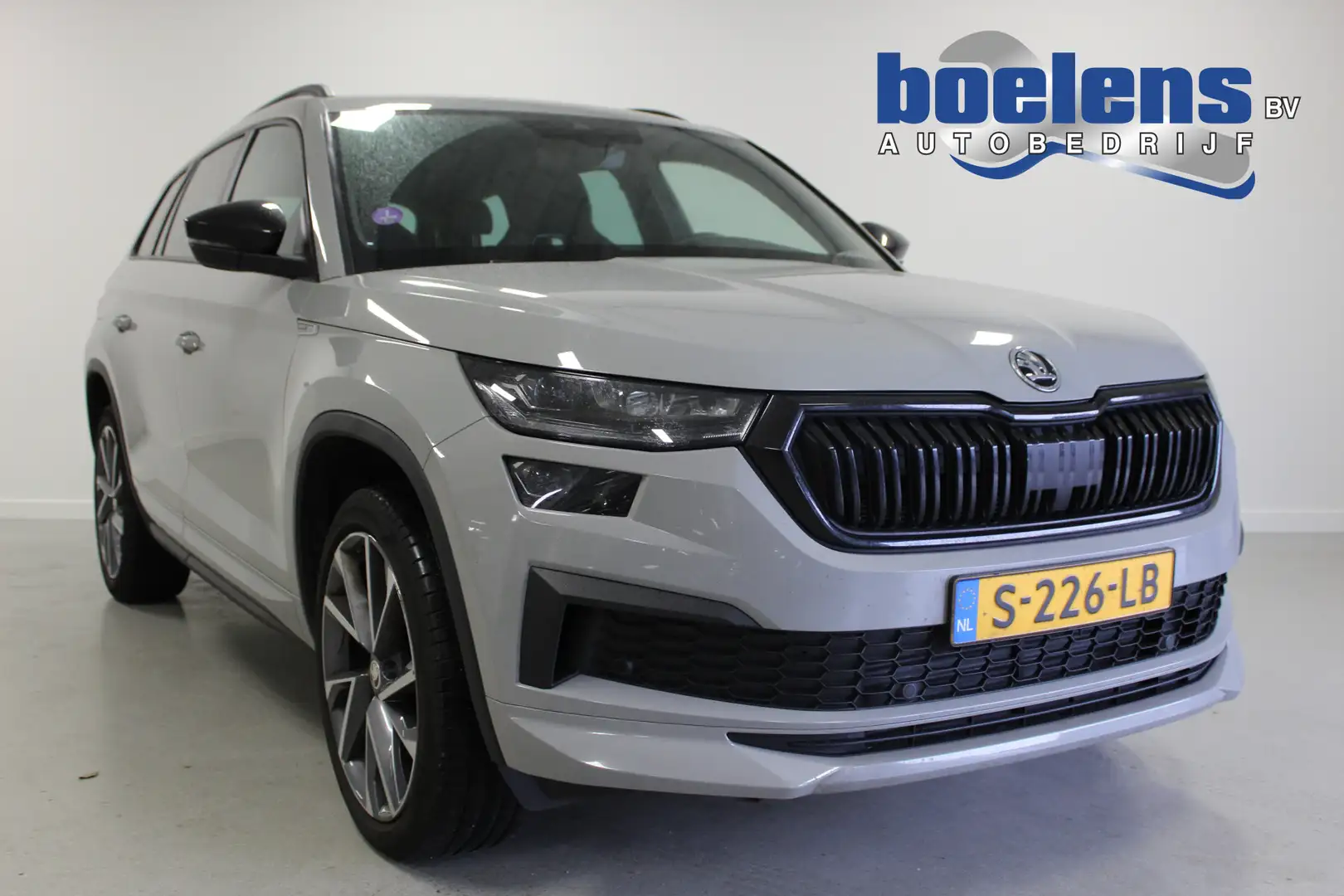Skoda Kodiaq 1.5 TSI Sportline Business 7p. | 20'LMV | ACC | CA Grijs - 1