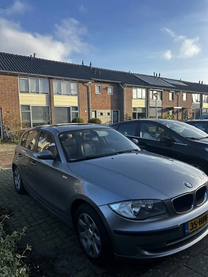 BMW BMW 1-Serie 1.6 116I 5DR 2008 Grijs - 1