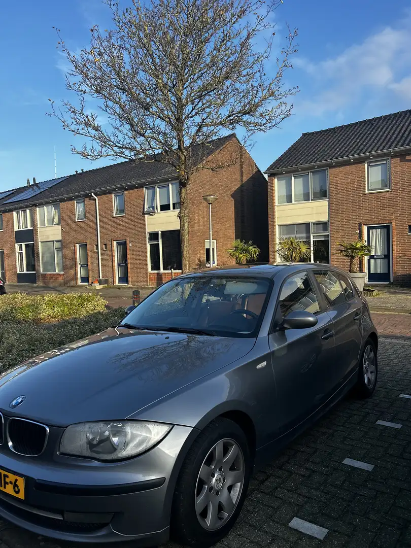 BMW BMW 1-Serie 1.6 116I 5DR 2008 Grijs - 2