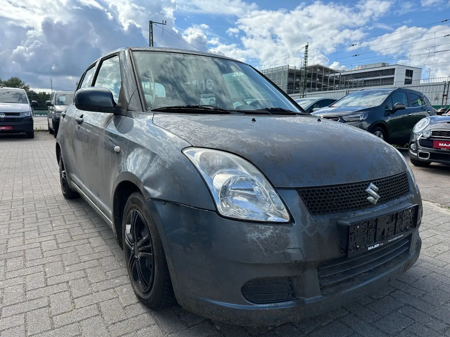 Suzuki Swift Lim. Dance Club Grau - 1