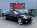BMW 320 320i AUT High Exec Leder Navi Xenon Stoelverw Trek Zwart - thumbnail 2