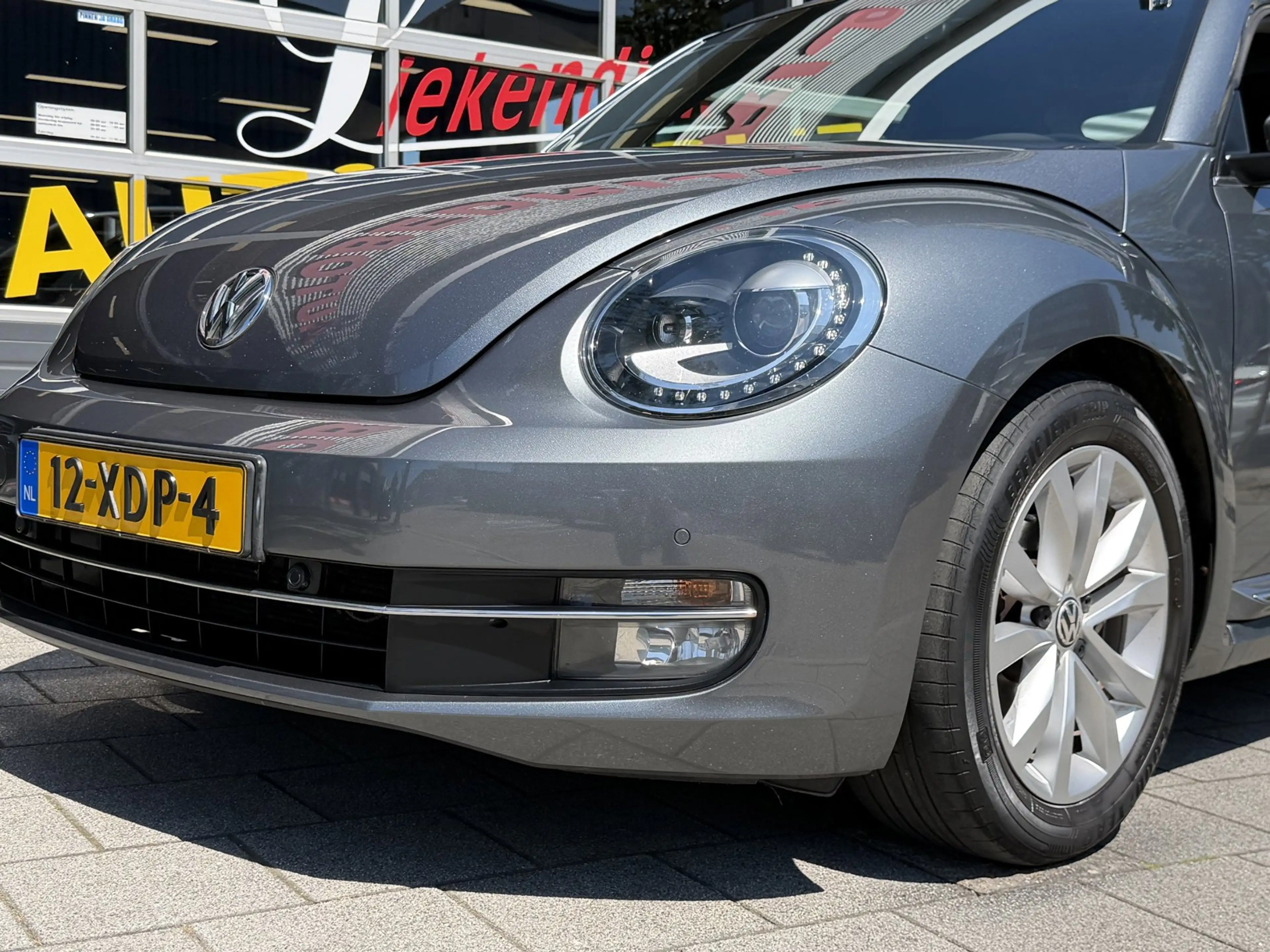 Volkswagen Beetle 1.2 TSI Designo Edition - Navigatie I Airco I PDC — photo 10