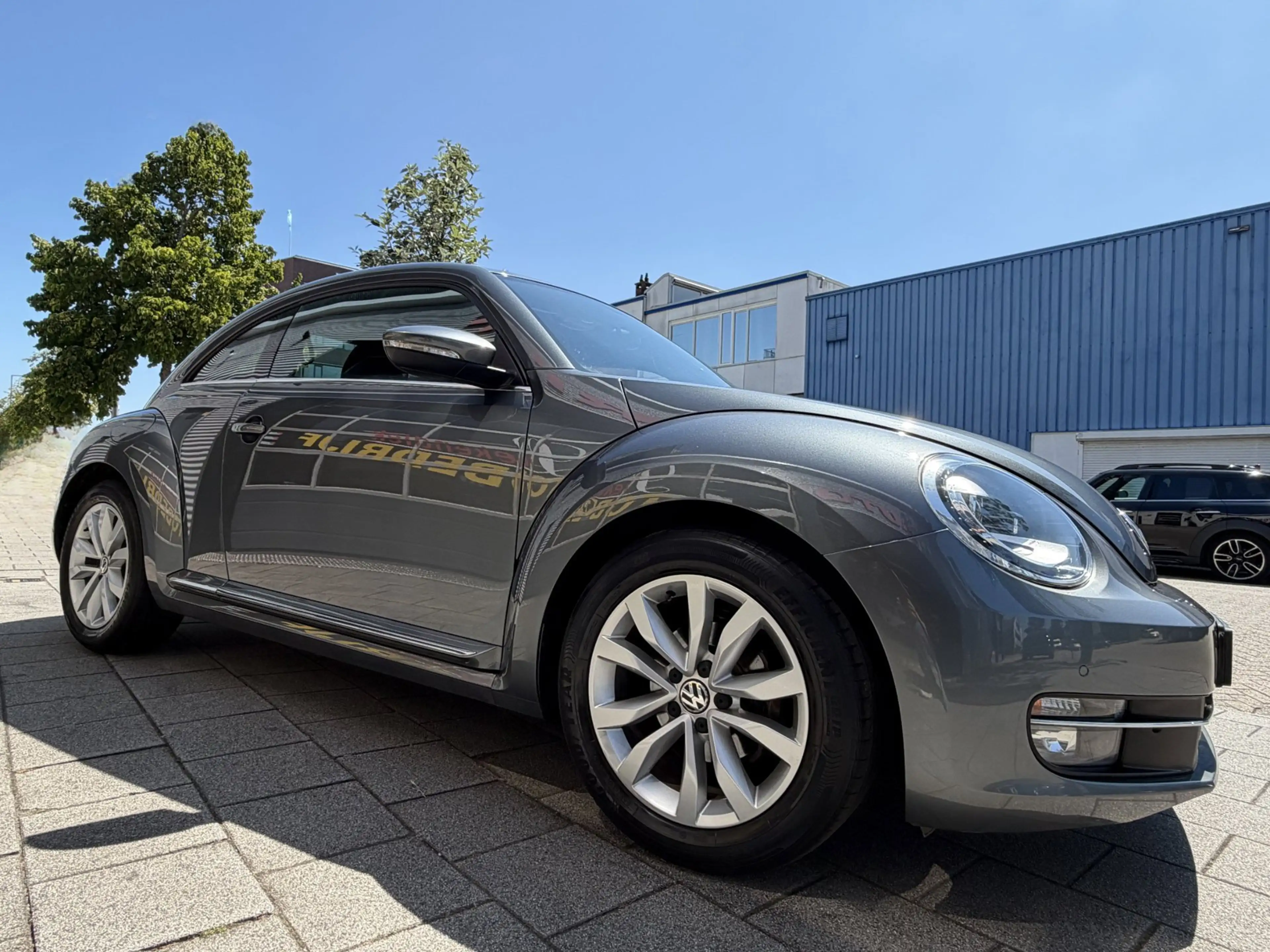Volkswagen Beetle 1.2 TSI Designo Edition - Navigatie I Airco I PDC — photo 9