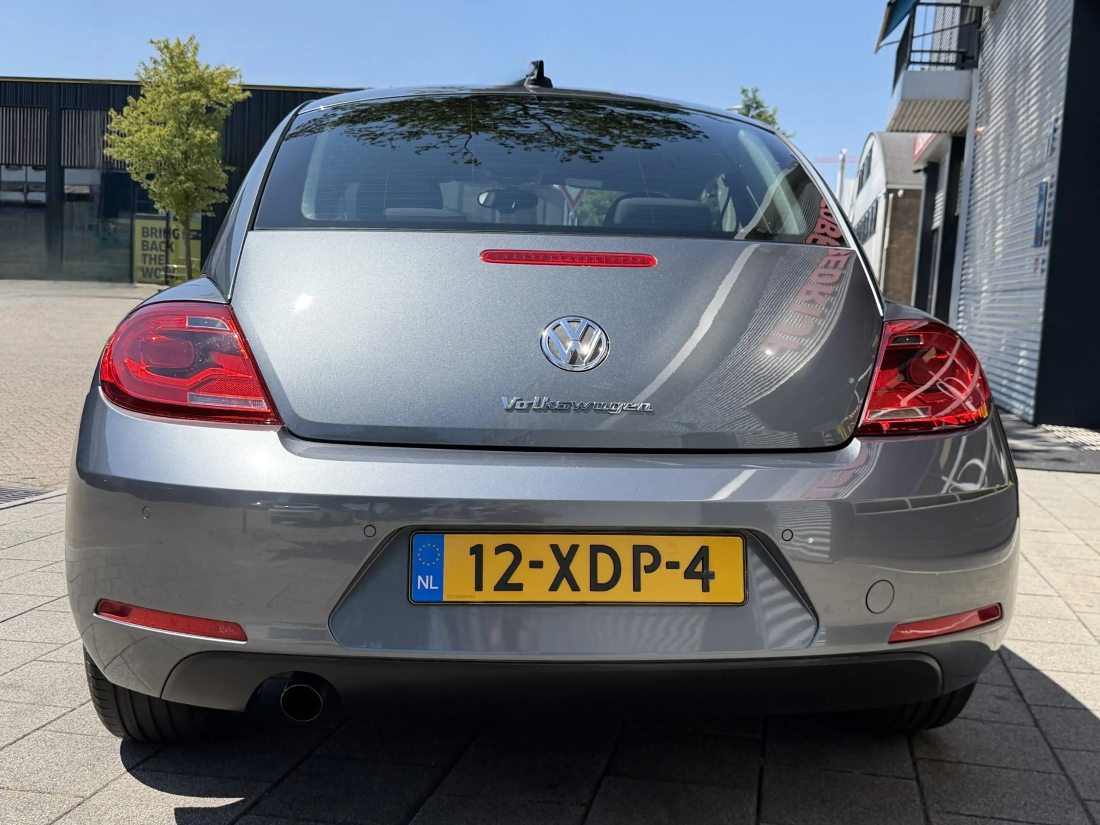 Volkswagen Beetle 1.2 TSI Designo Edition - Navigatie I Airco I PDC — photo 7