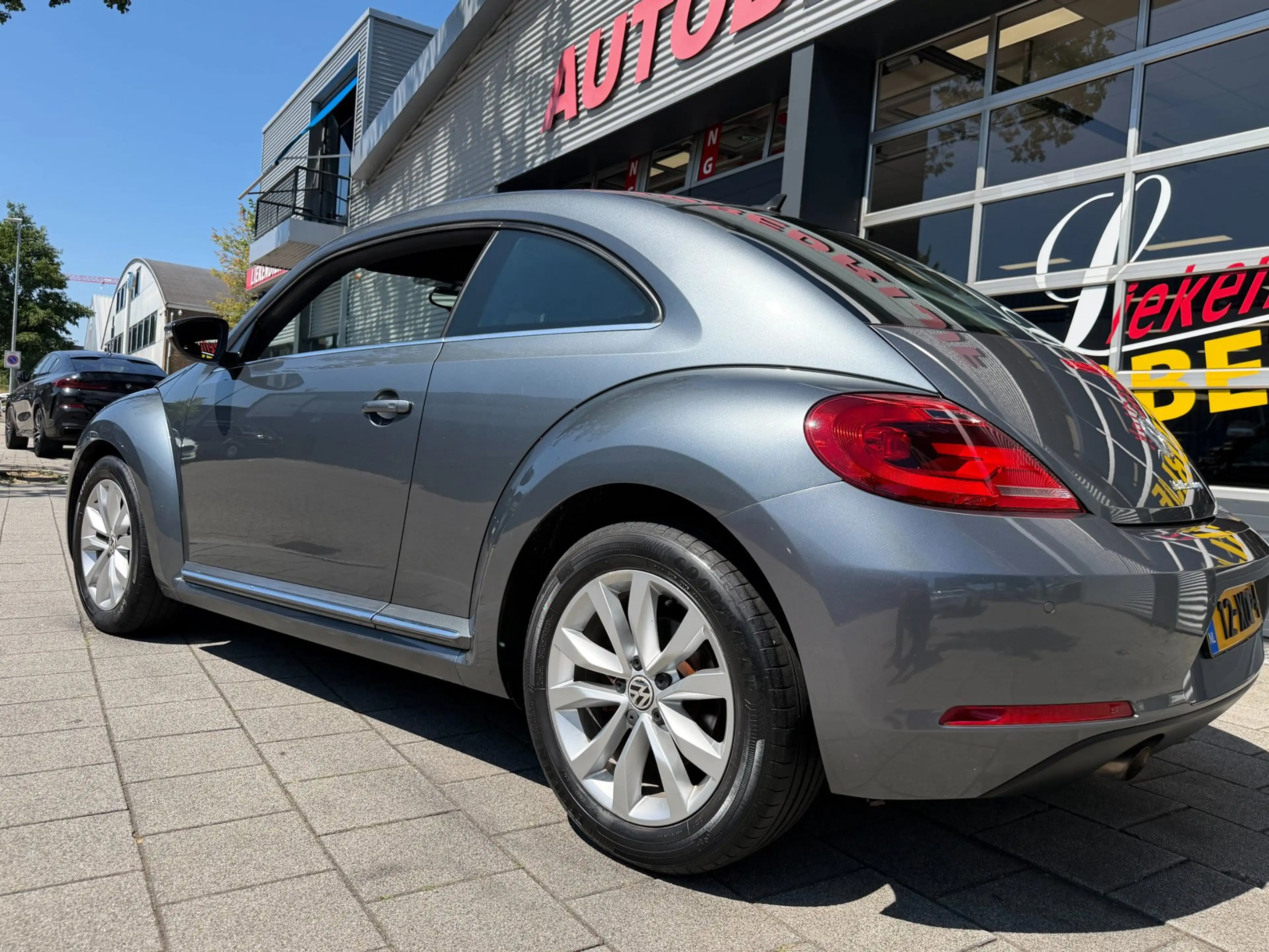 Volkswagen Beetle 1.2 TSI Designo Edition - Navigatie I Airco I PDC — photo 8