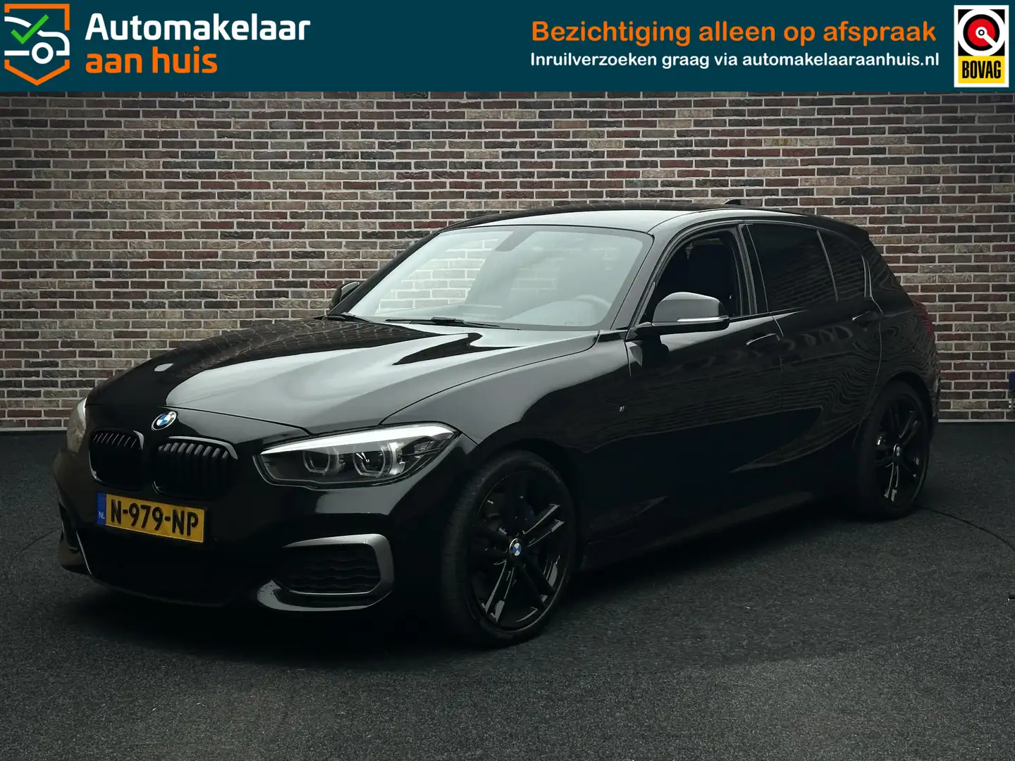 BMW 140 1-serie M140i xDrive Edition Shadow High Executive Zwart - 1