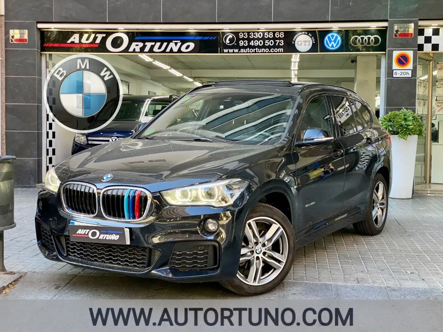 BMW X1 sDrive 18dA Business Zwart - 1