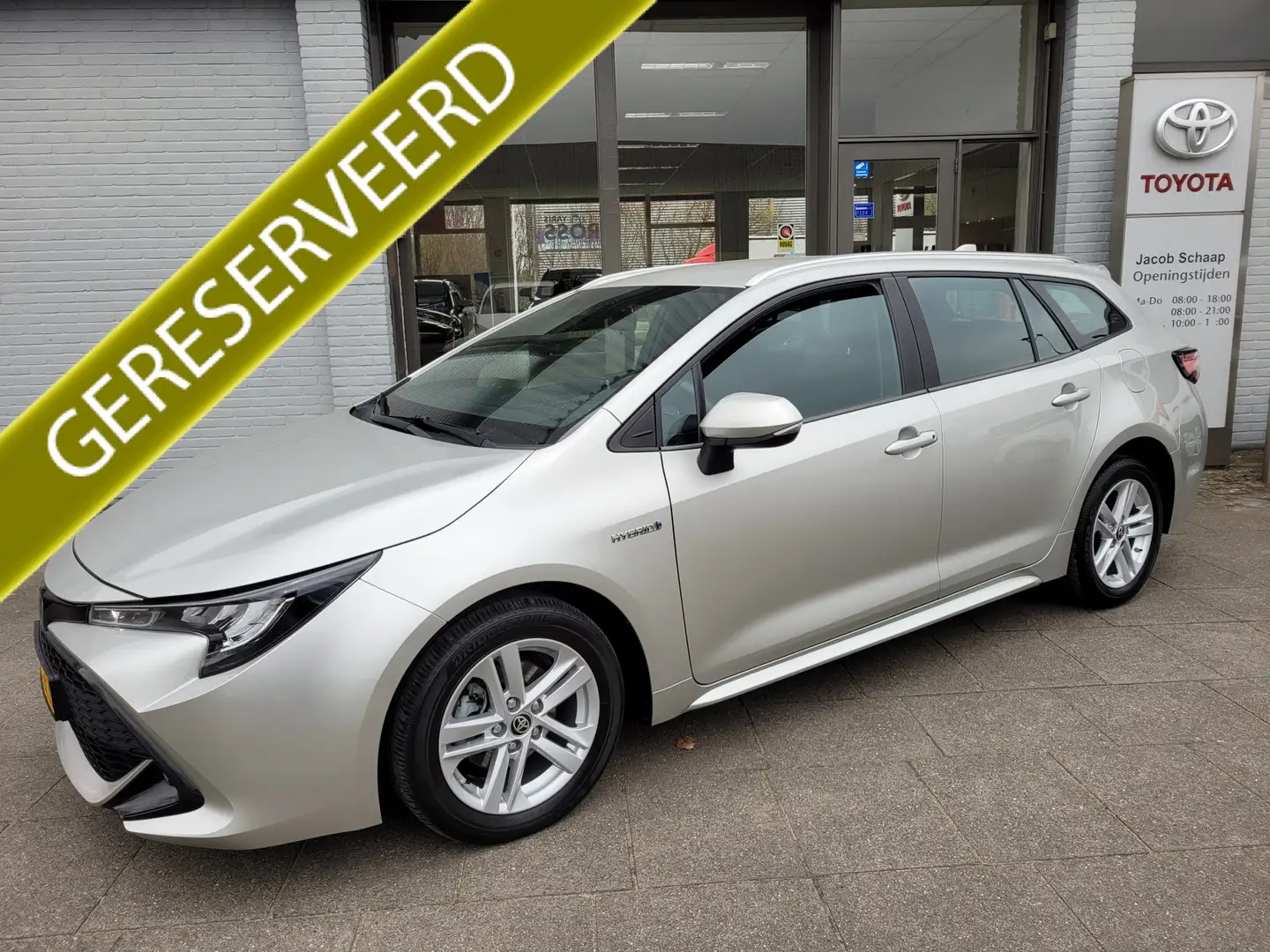 Toyota Corolla Touring Sports 1.8 Hybrid Active Automaat van 1e e Grijs - 1