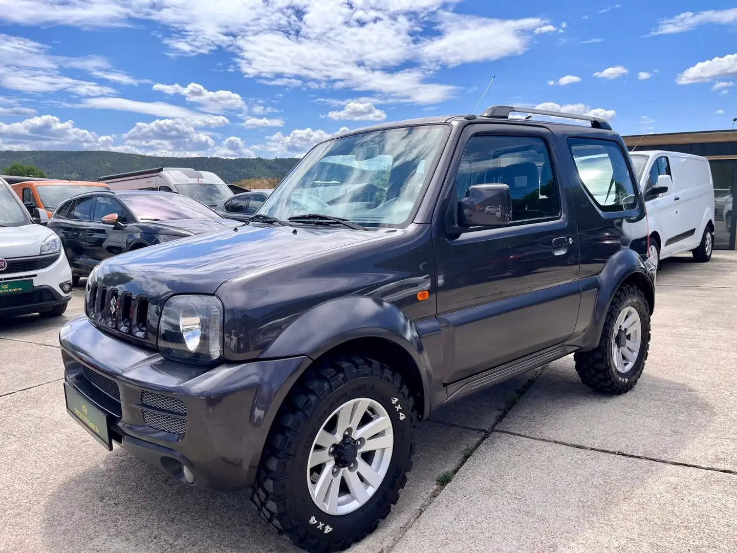 Suzuki Jimny 4x4 Benzin Allrad Klima AHK TÜV neu 4 Sitz Grau - 1