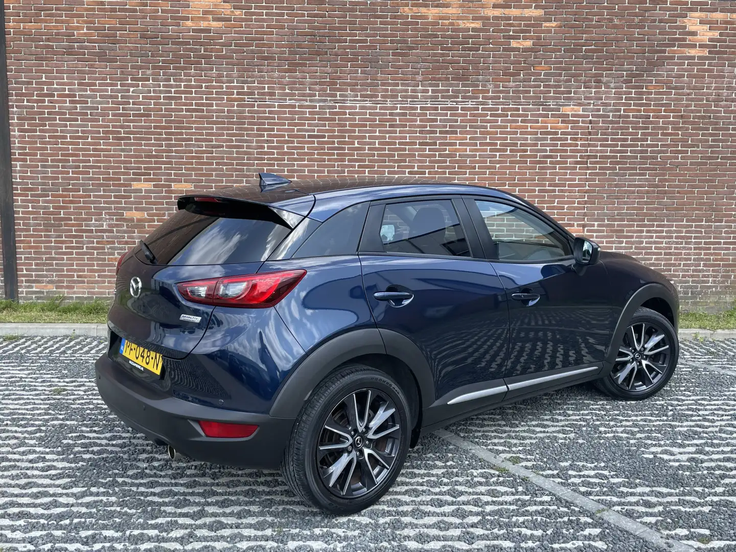 Mazda CX-3 2.0 SkyActiv-G 120 GT-M | AUTOMAAT | NAVI | CLIMA Blauw - 2