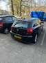 BMW 118 118i Executive Zwart - thumbnail 2