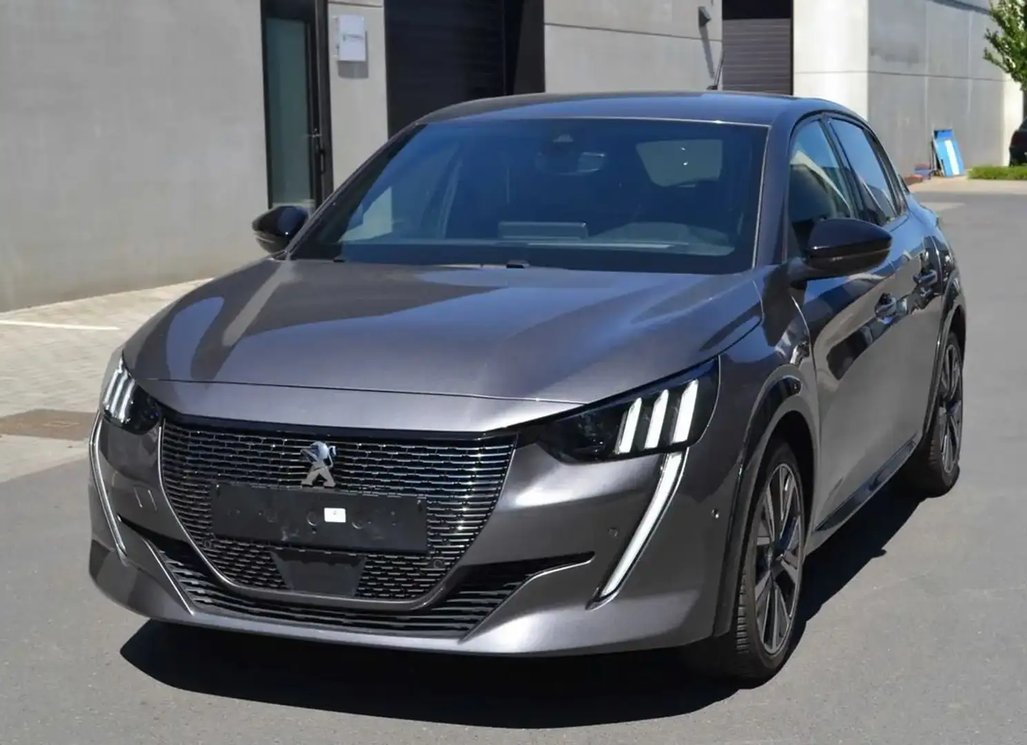 Peugeot 208 1.2i EAT8 GT Navi/Semi-Cuir/LED/Cam360°/TVA Grijs - 1