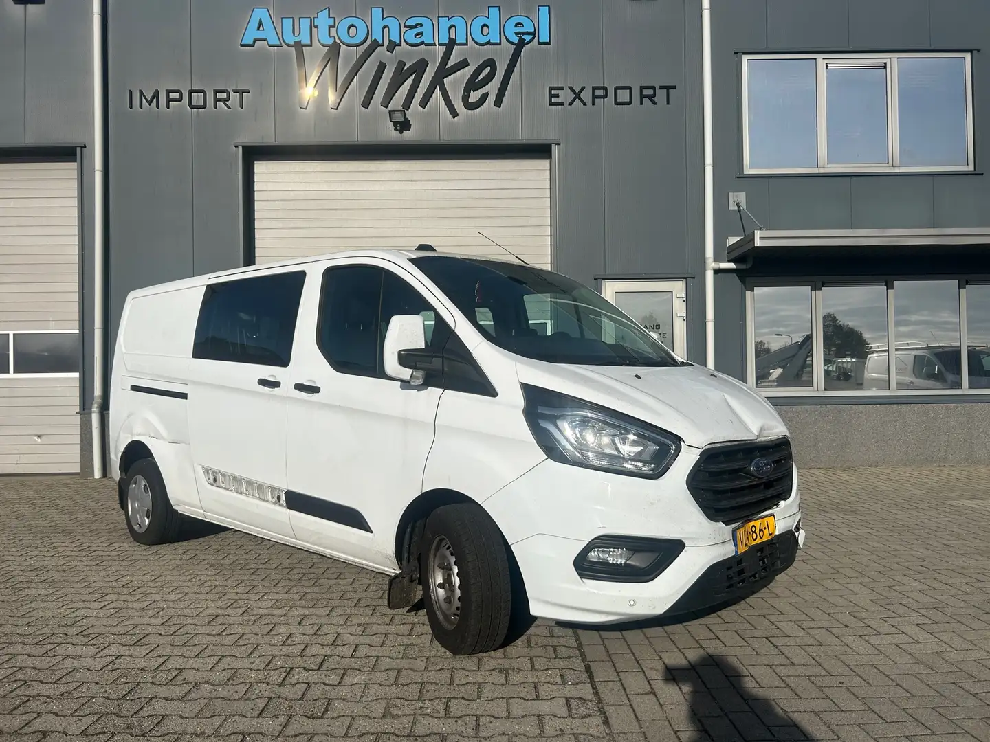 Ford Transit Custom 300 2.0 TDCI L2H1 Trend DC 6 PERS. Weiß - 1