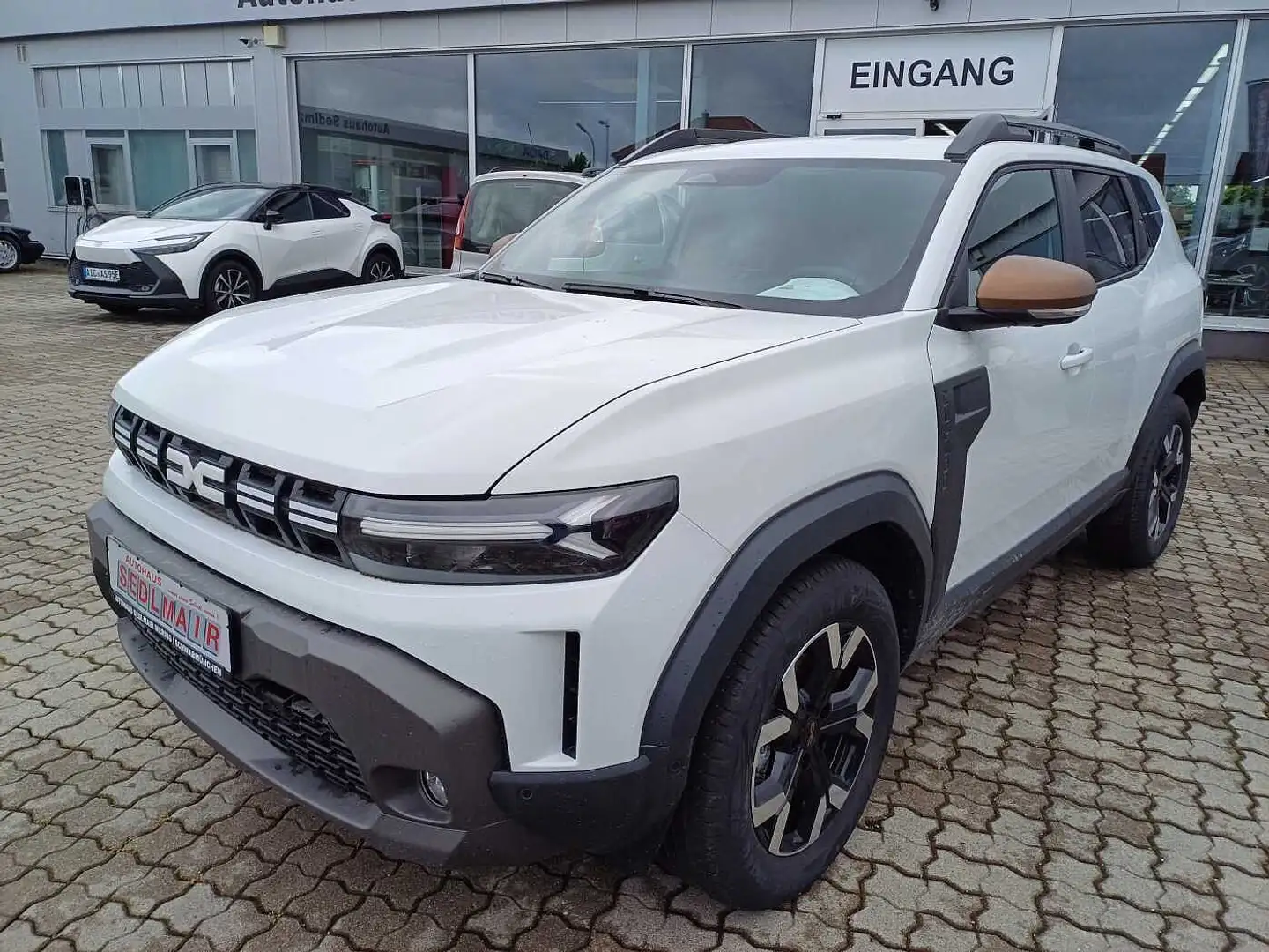 Dacia Duster Hybrid/Aut. 140 Extreme/Winterpaket+City-Paket Weiß - 1