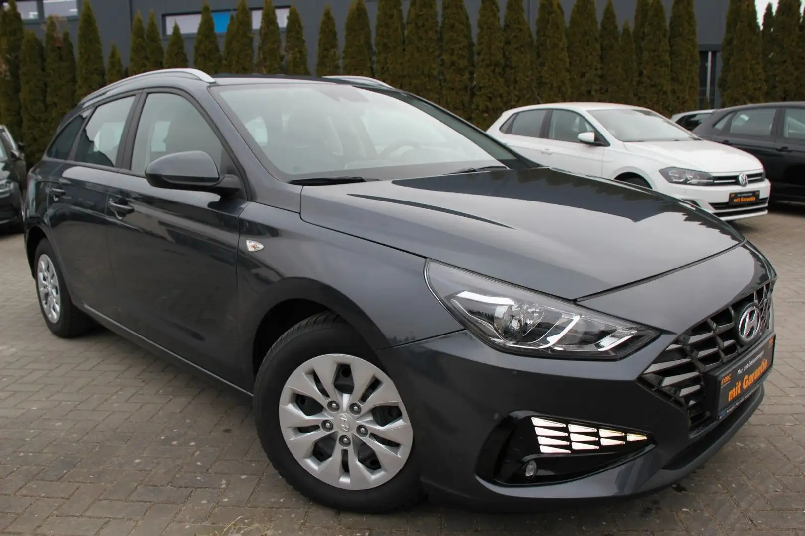 Hyundai i30 T-GDI Automatik Klima/PDC/8xReifen/Bluetooth Gris - 1