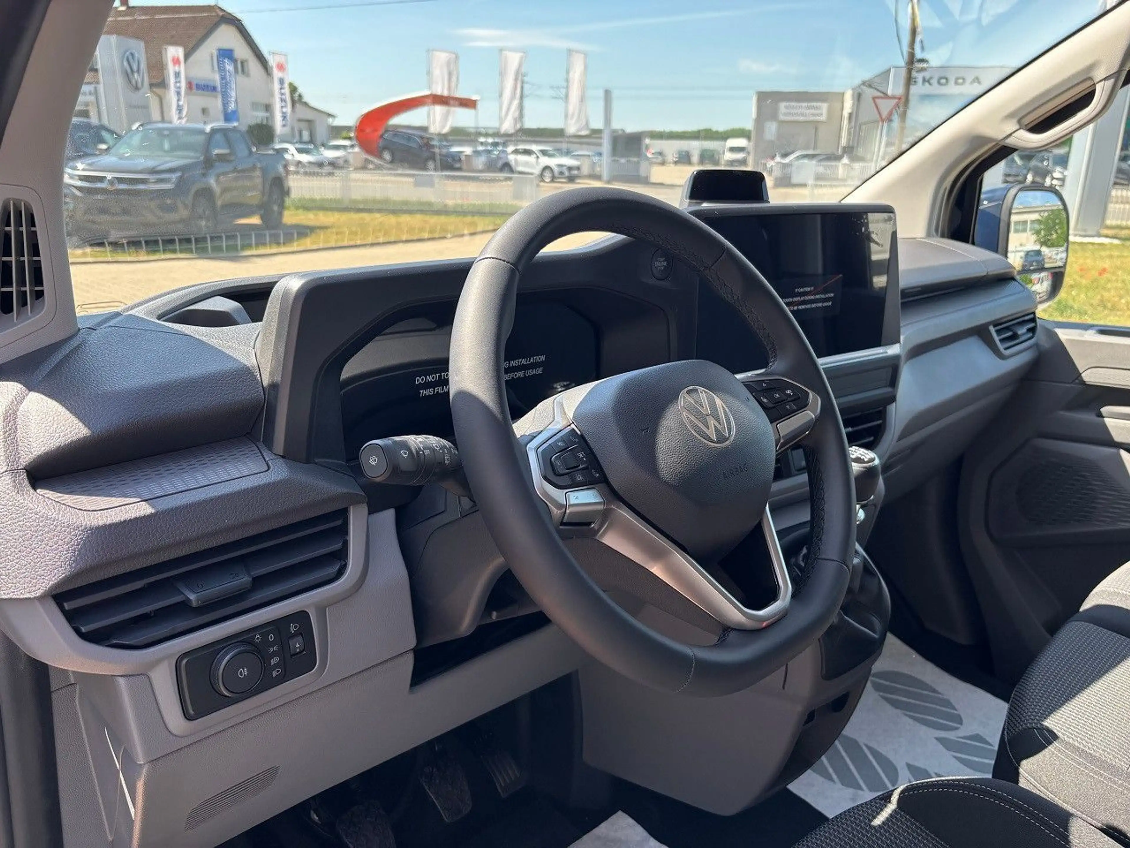 Volkswagen T7 Kombi 2.0 TDI Lang 9-Si AHK ZHZ 3-Zone Expak — photo 10