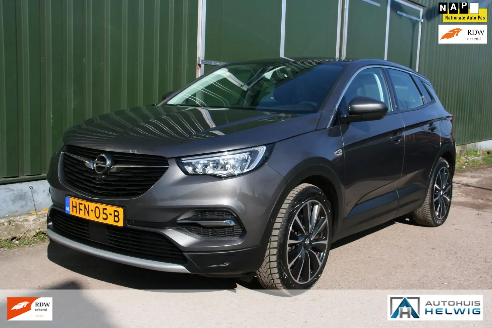 Opel Grandland 1.6 Turbo Hybrid4 Innovation AWD, LEER, NAVIGATIE, Grijs - 1