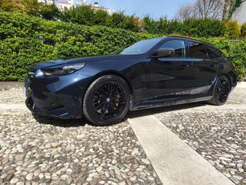 Touring 4.4 727cv auto