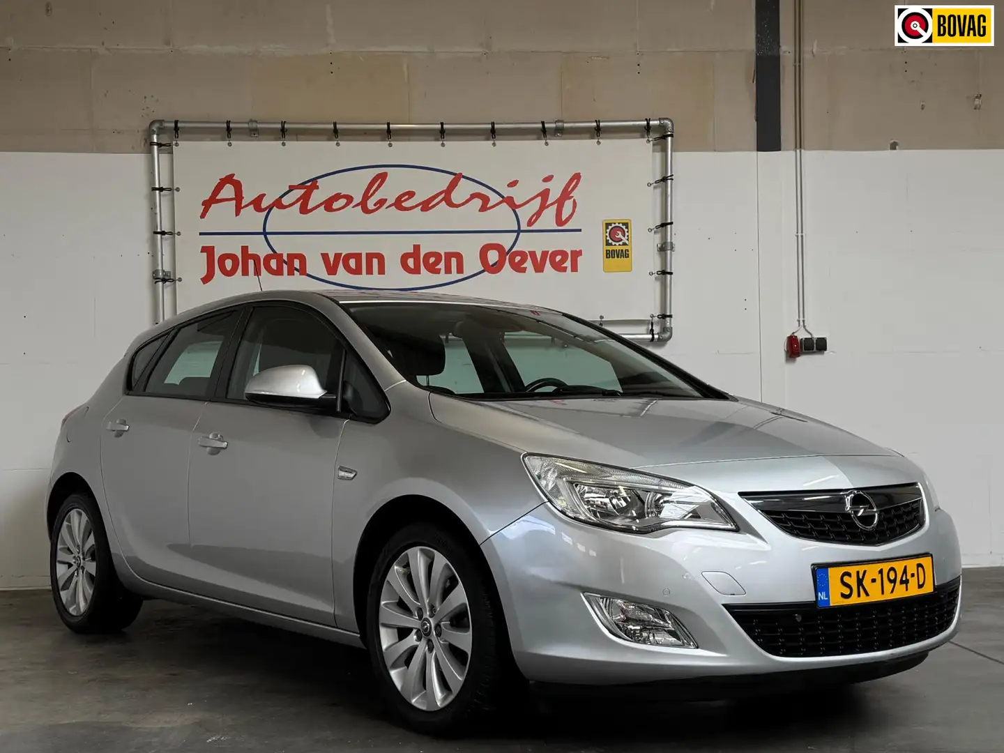 Opel Astra 1.6 Sport|Stoel/Stuurverwarming|PDC|Automaat| Grigio - 1