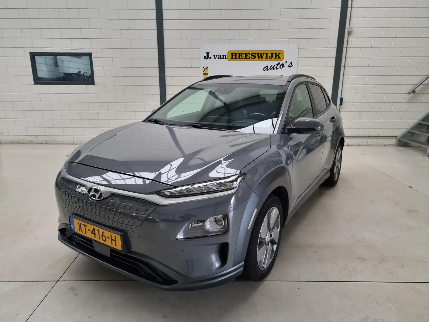 Hyundai KONA EV Premium 64 kWh Ecc | Schuifdak | lmv |Keyless | Gris - 1