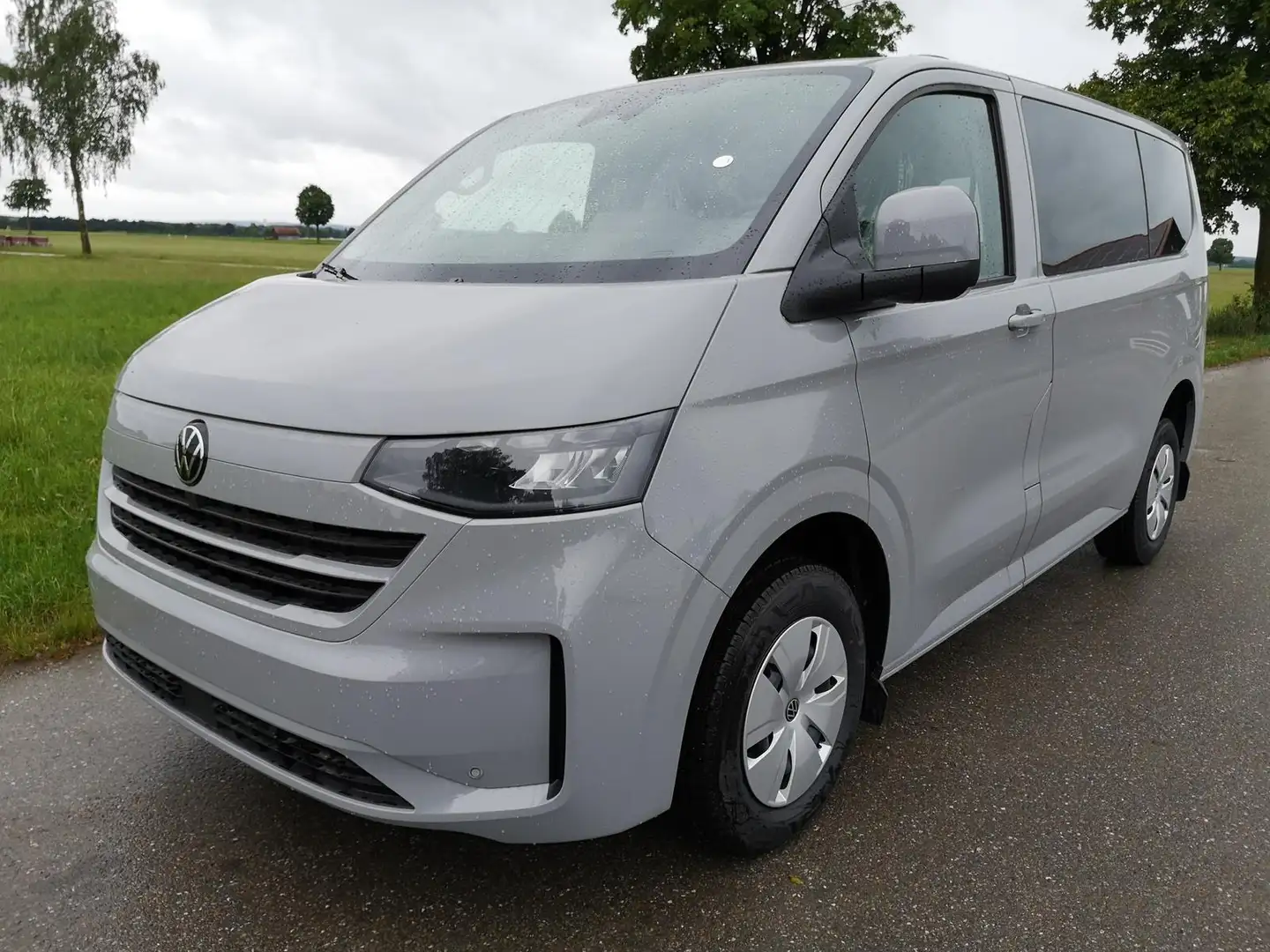 Volkswagen T7 Transporter 2.0 TDI 110 kW KR DSG 9 Sitzer Kamera AHK GV5 1... Grau - 1